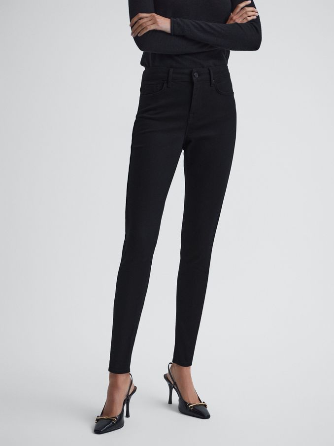 Mid Rise Skinny Jeans in Black (U65565) | US$75