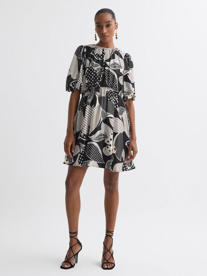 Florere Polka Dot Puff Sleeve Mini Dress in Black (U74949) | €102