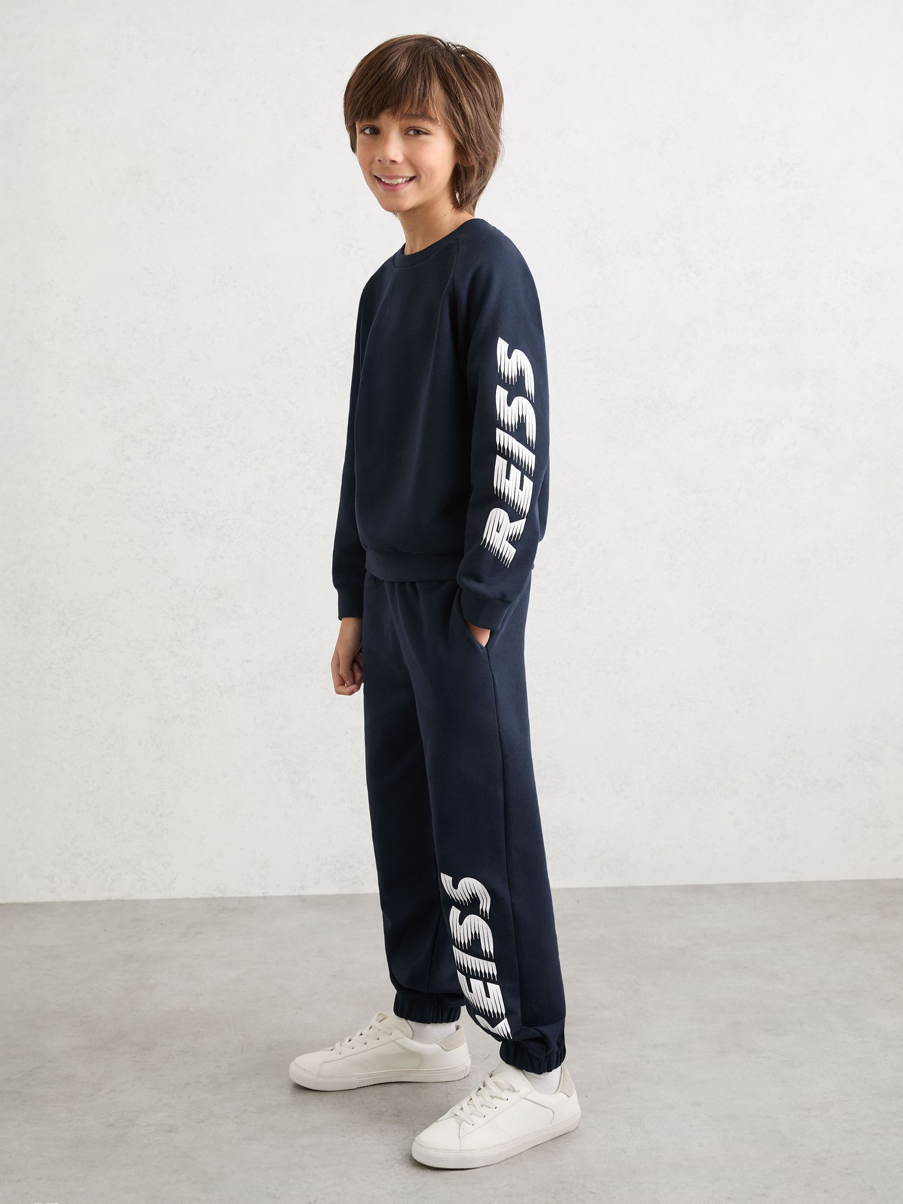 Cotton Logo-Print Cuffed Joggers in Navy (W08124) | €50