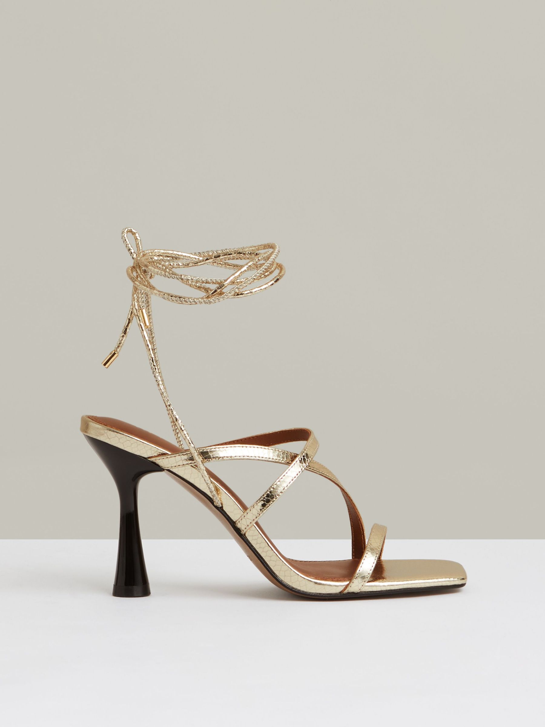 Leather Metallic Strappy Heeled Sandals in Gold (W31577) | US$265