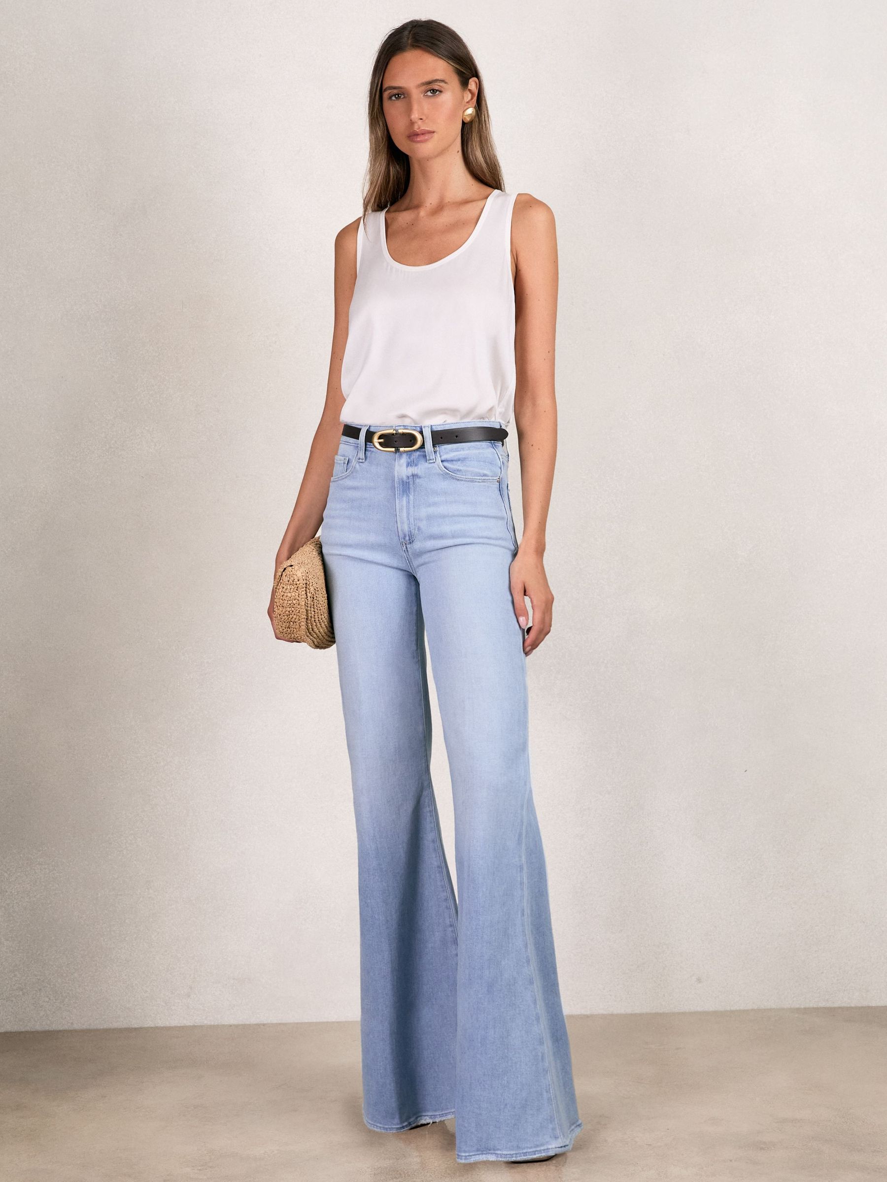 Paige Mid-Rise Flared Jeans in Light Blue (W35708) | €258