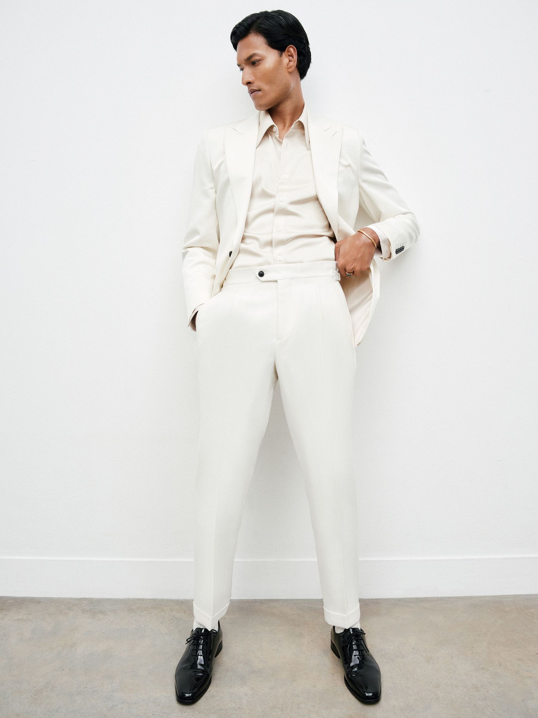 Wool-Blend Tailored-Fit Cuffed Trousers in White (W69539) | $275