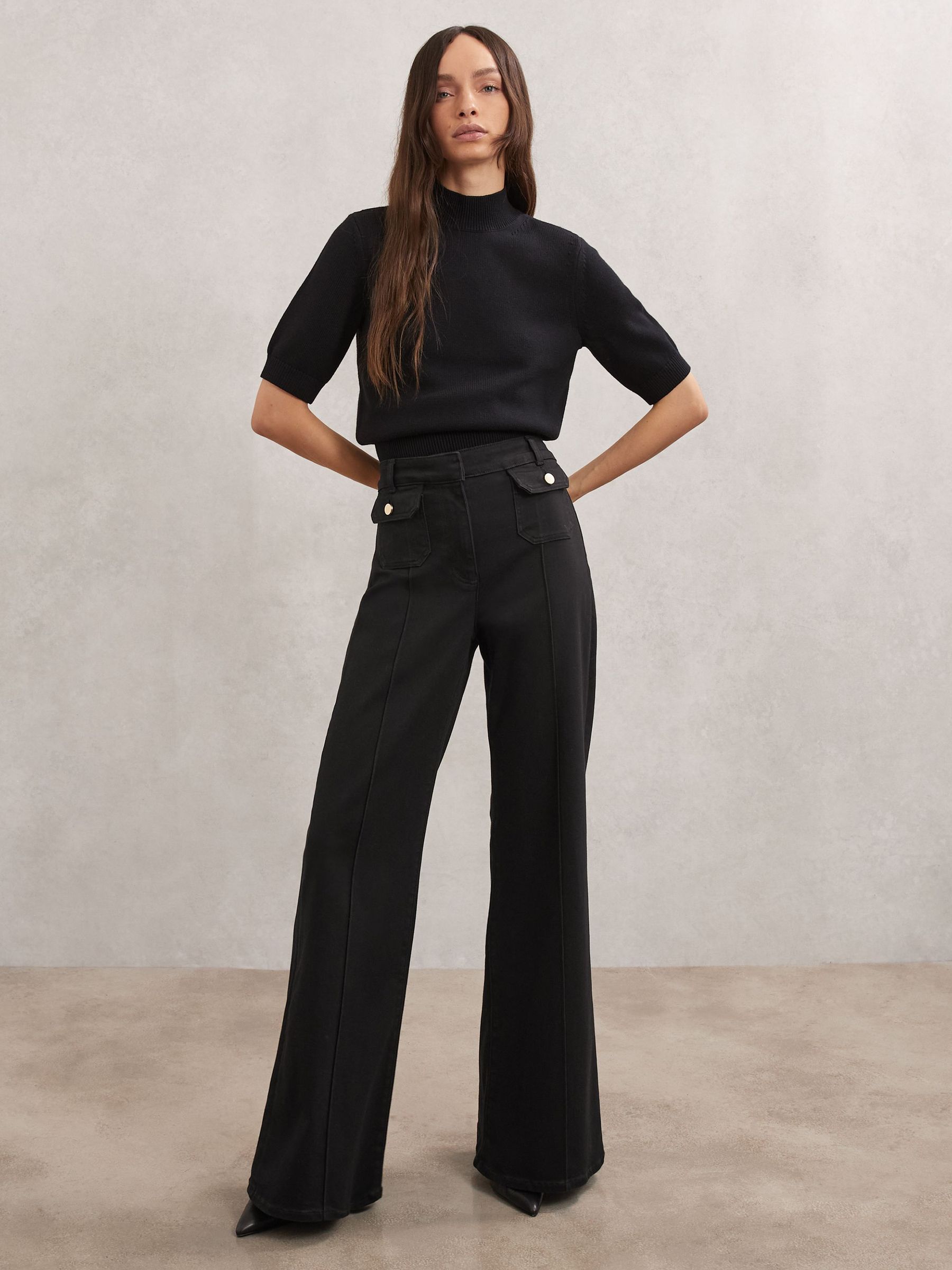 Petite Flared Pocket-Detail Jeans in Black (Y04690) | $295