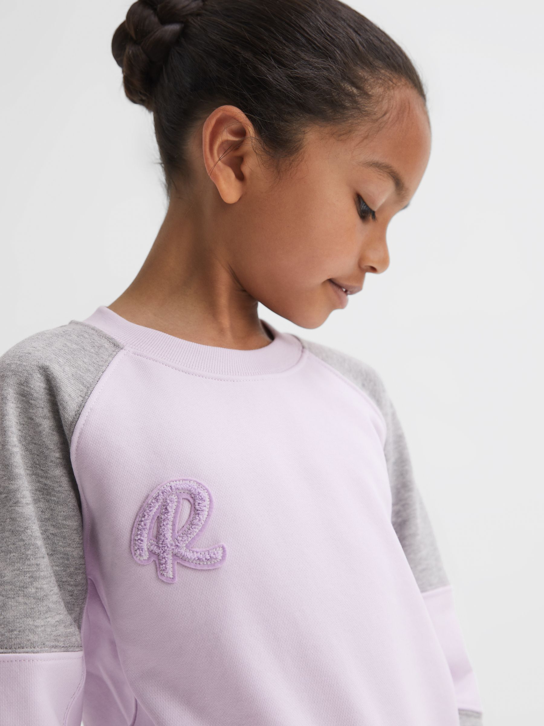 9-14 yrs Colourblock Motif Jersey Jumper in Lilac - Image 1 of 6