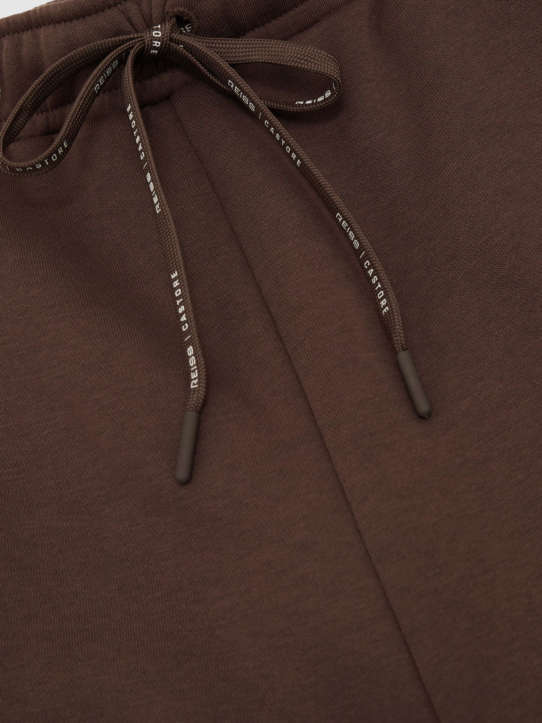Reiss | Castore Relaxed-Fit Fleece Joggers in Cocoa Bark/Stone - Image 6 of 6
