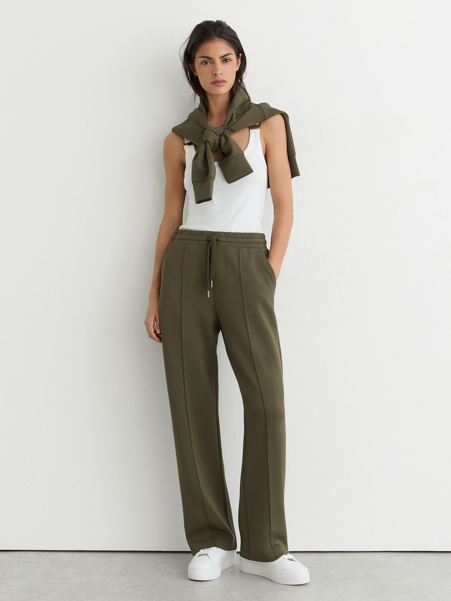 Petite Premium Interlock Wide-Leg Joggers in Khaki Green - Image 1 of 8 Petite Premium Interlock Wide-Leg Joggers in Khaki Green - Image 1 of 8