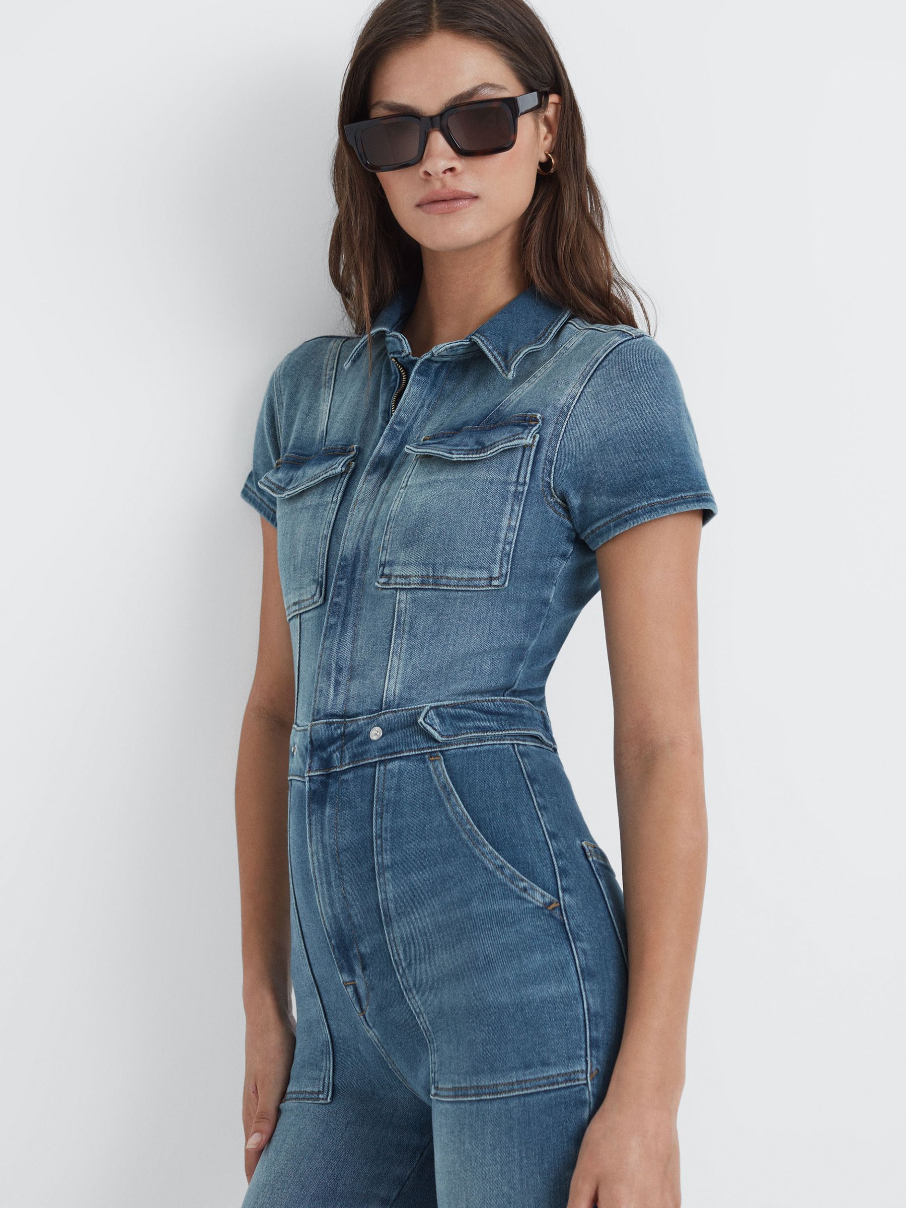 Good American Denim Bootcut Jumpsuit in Blue - Image 3 of 5