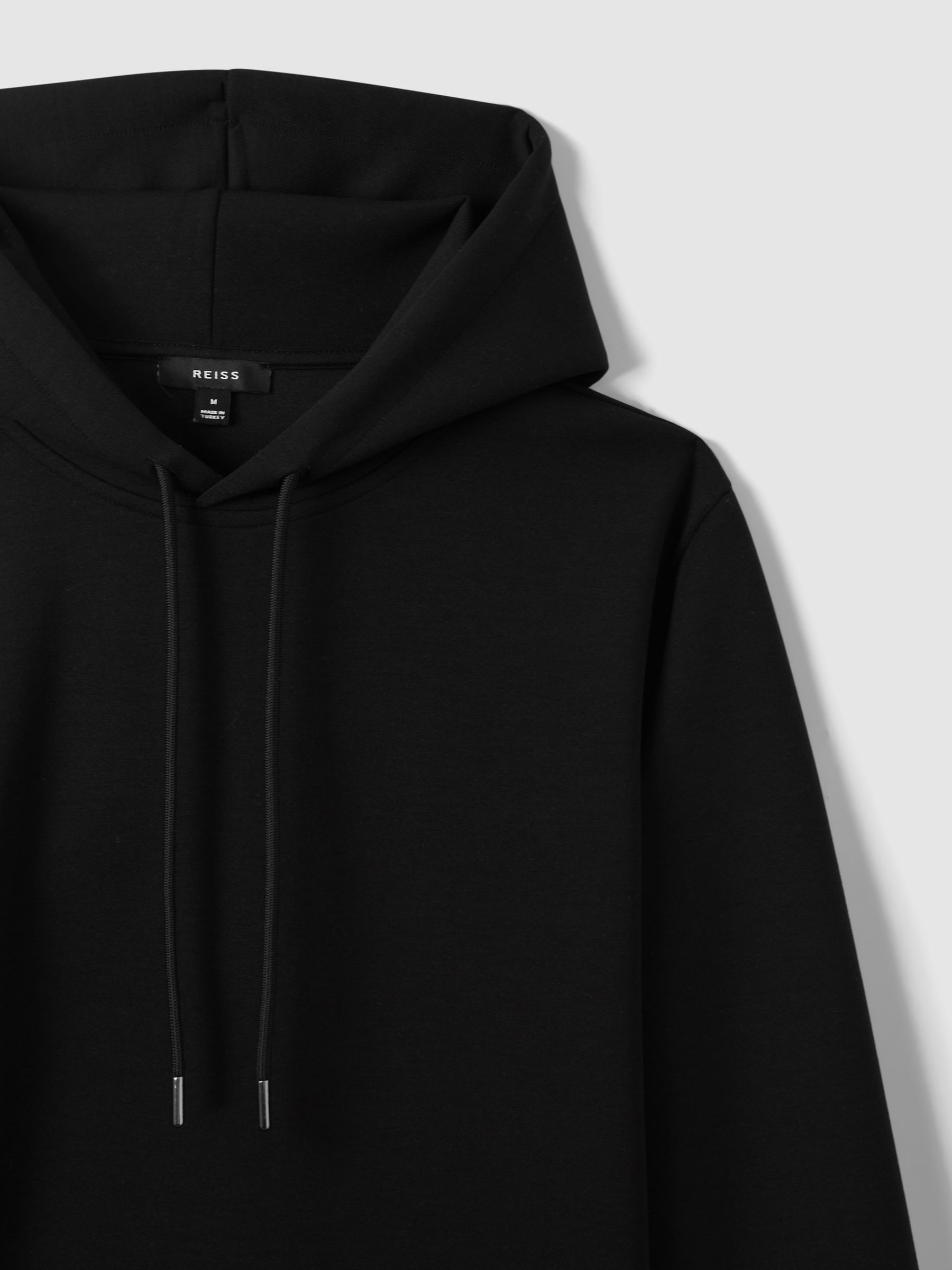 Interlock Jersey Drawstring Hoodie in Black - Image 5 of 7