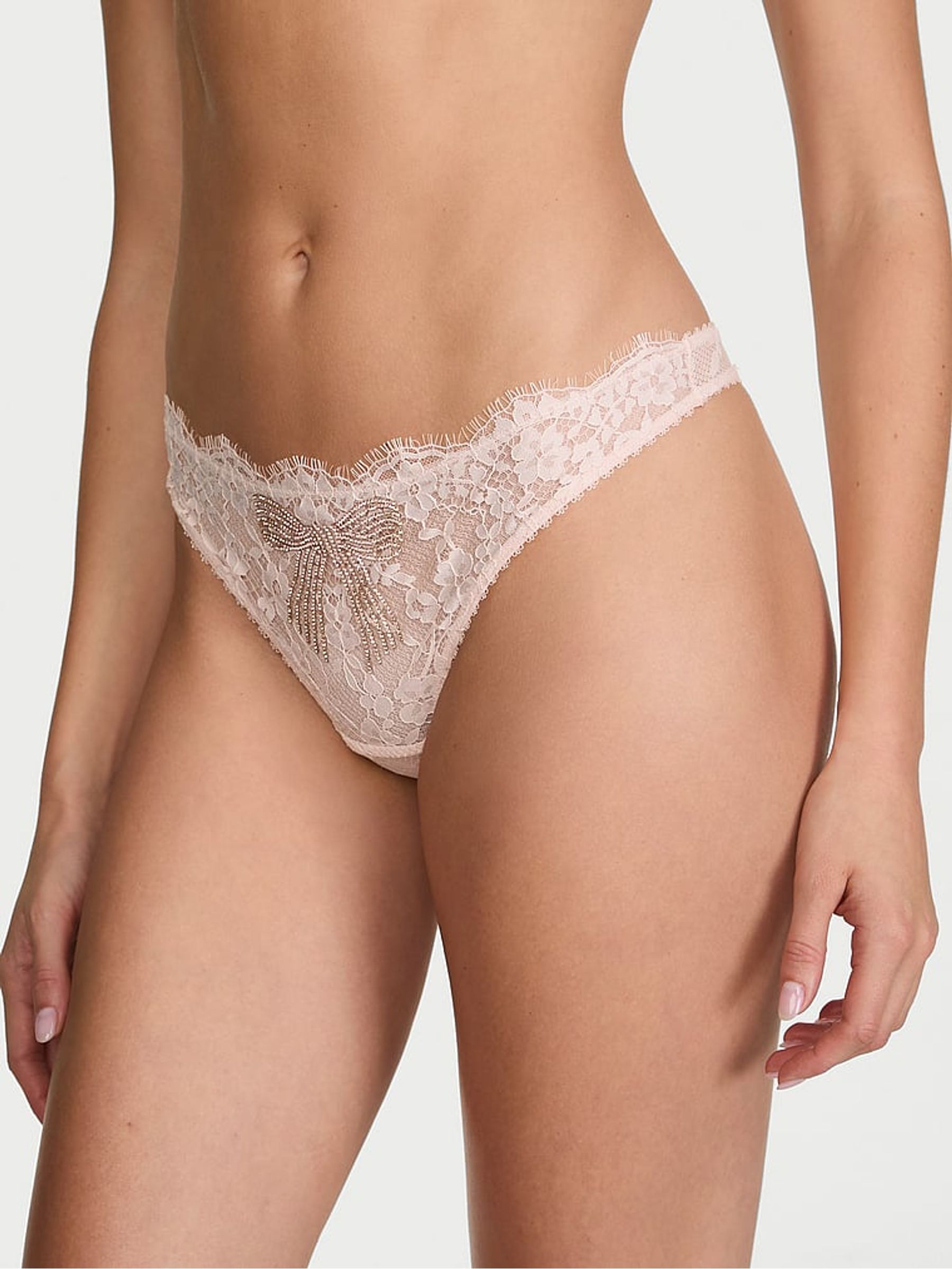 Sheer Blush Pink Thong Shine Bow Lace Knickers - Image 1 of 2 Sheer Blush Pink Thong Shine Bow Lace Knickers - Image 1 of 2