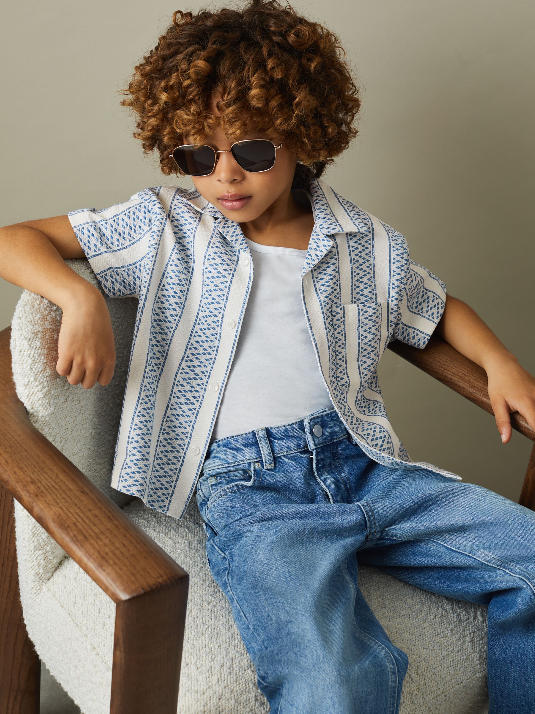3-9 yrs Herringbone Cuban Collar Shirt in Blue/White - Image 1 of 5 3-9 yrs Herringbone Cuban Collar Shirt in Blue/White - Image 1 of 5