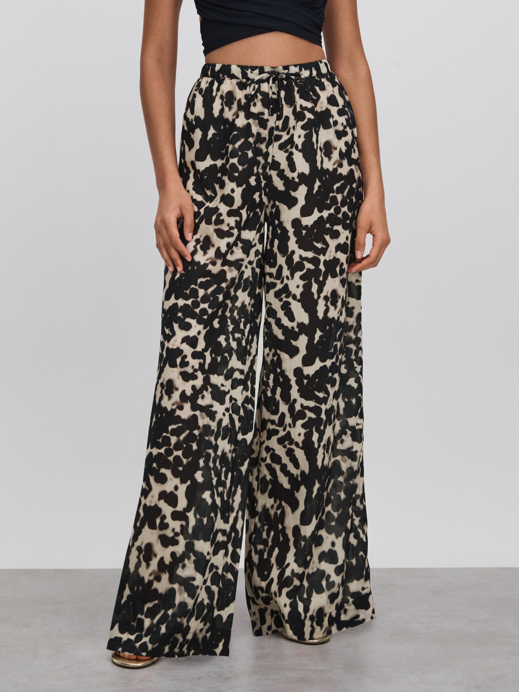 Calvin Klein Swimwear Sheer Cotton Drawstring Trousers in Animal Print/Black - Image 1 of 5