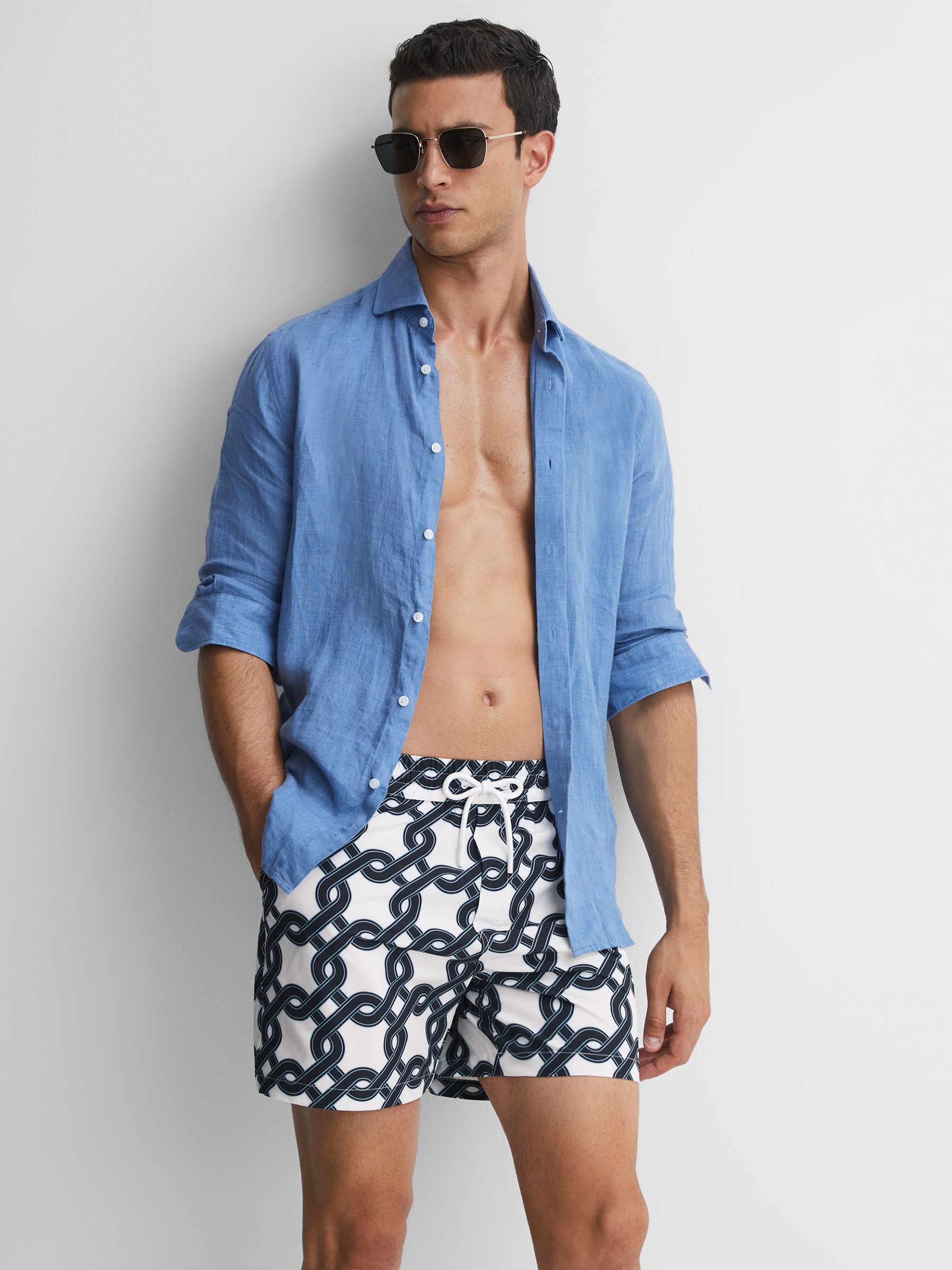 Print Drawstring Swim Shorts in White/Navy - Image 1 of 5 Print Drawstring Swim Shorts in White/Navy - Image 1 of 5