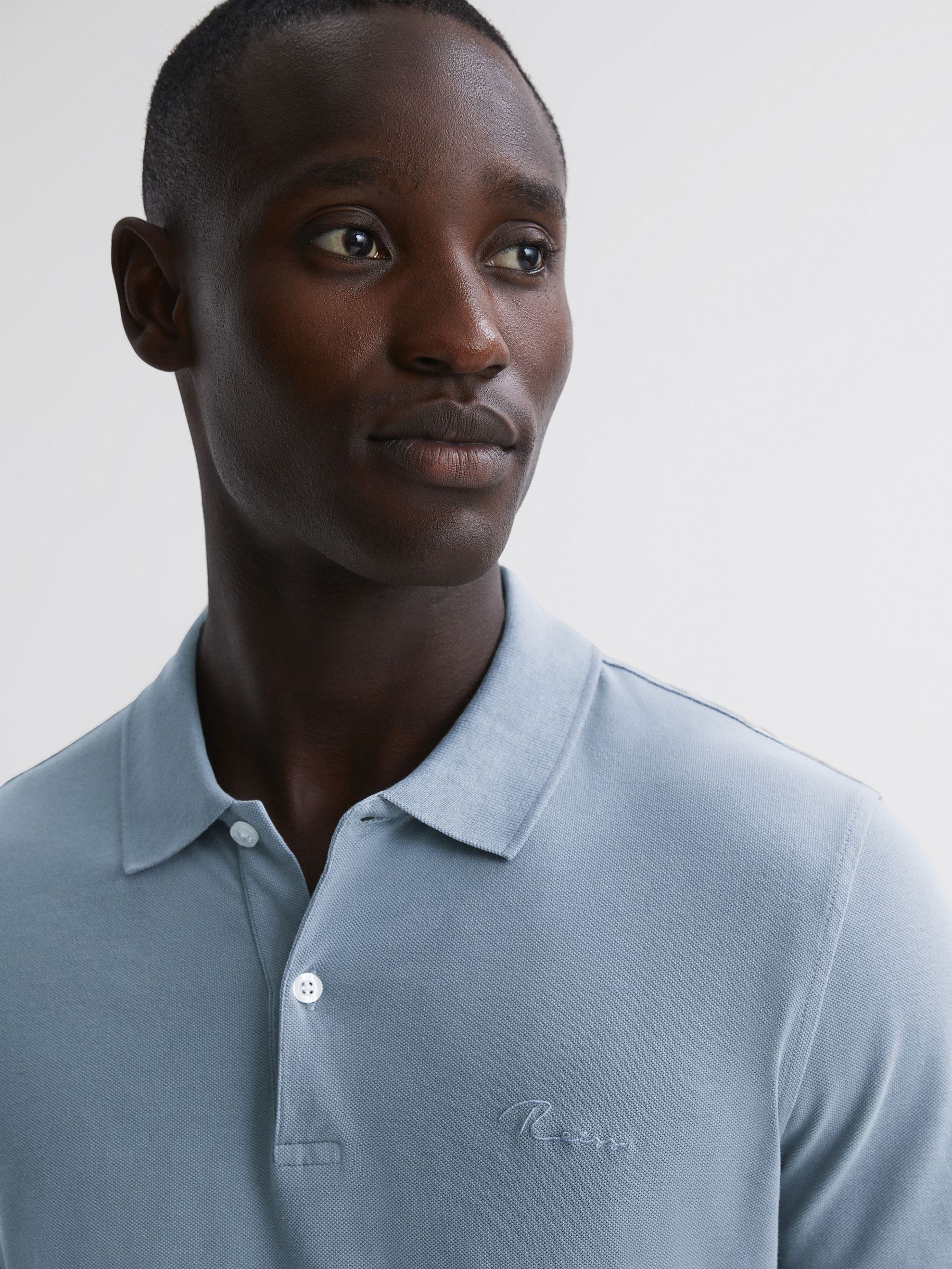 Slim Fit Garment Dyed Embroidered Polo Shirt in Soft Blue - Image 1 of 5