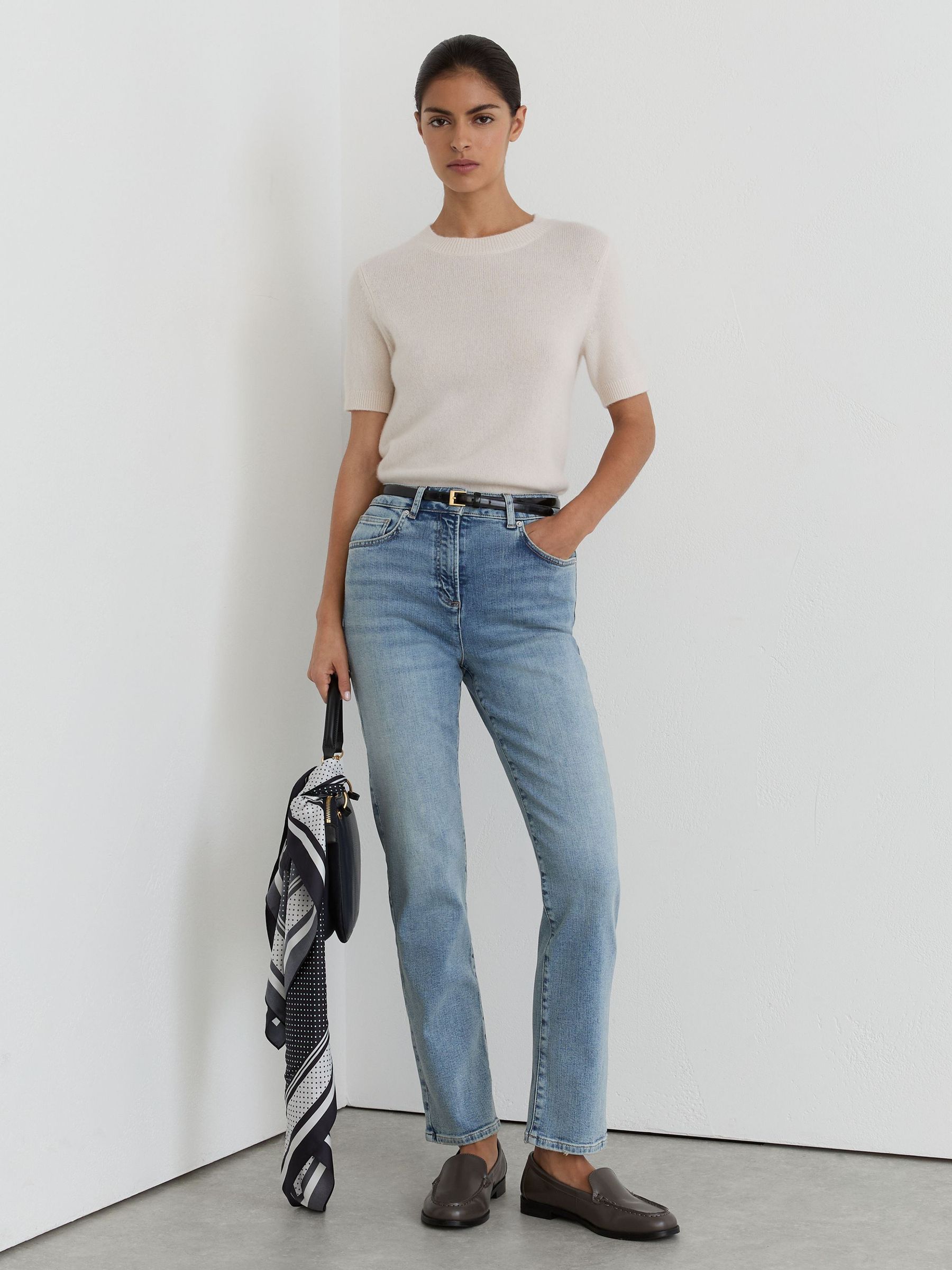 Slim-Leg Mid-Rise Jeans in Light Blue - Image 1 of 5 Slim-Leg Mid-Rise Jeans in Light Blue - Image 1 of 5