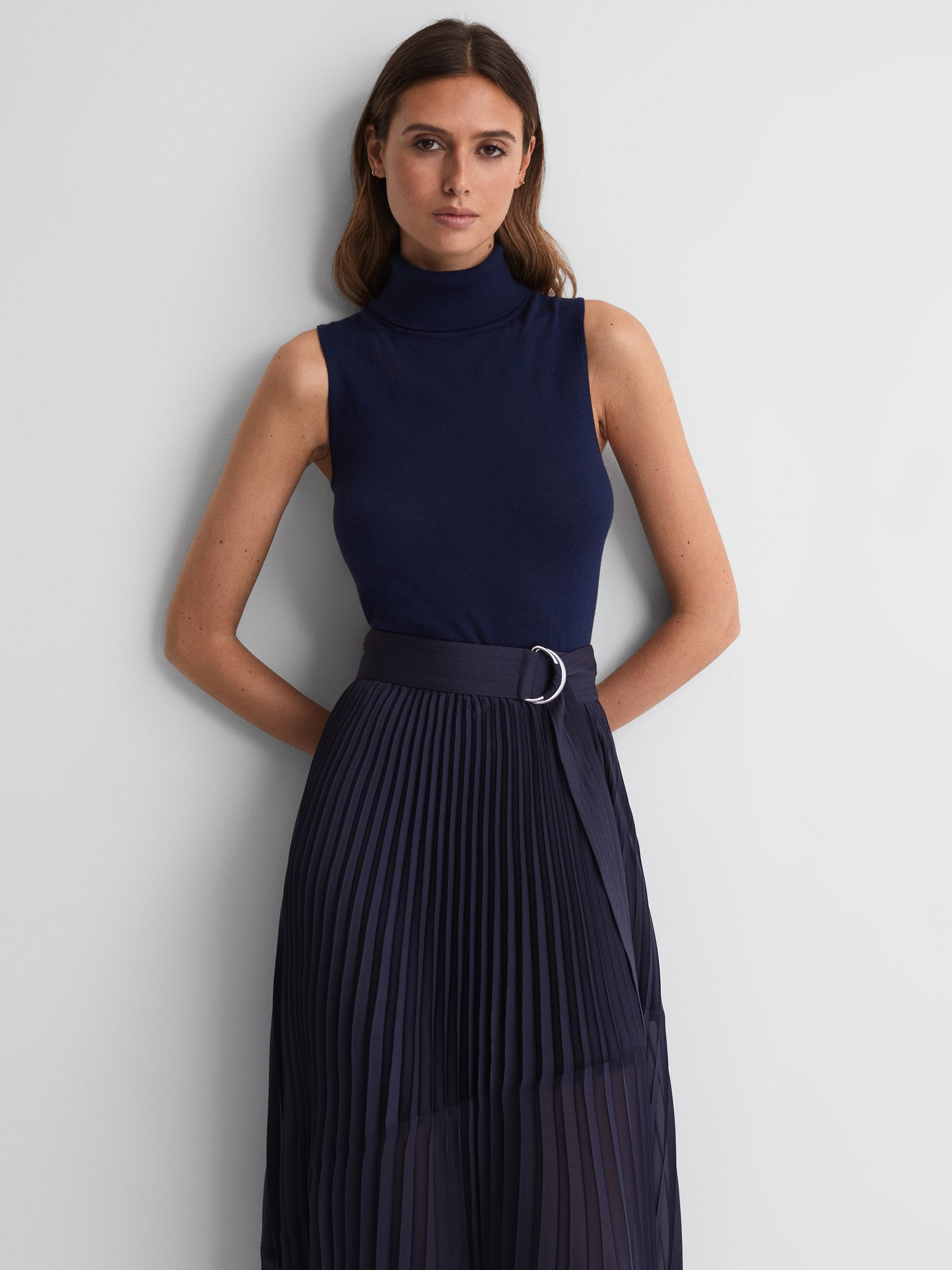 Merino Wool Sleeveless Roll Neck Top in Navy - Image 1 of 5