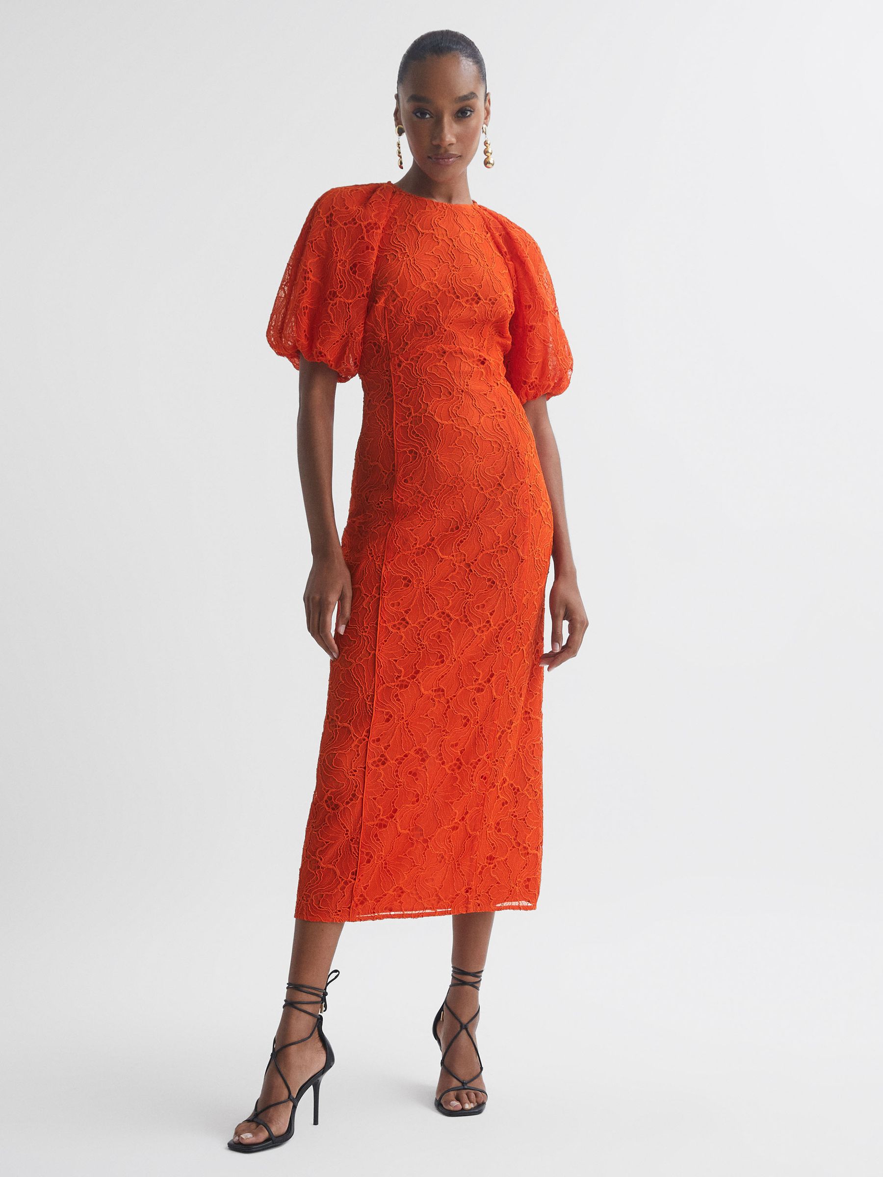 Florere Lace Puff Sleeve Midi Dress in Orange - Image 1 of 6 Florere Lace Puff Sleeve Midi Dress in Orange - Image 1 of 6