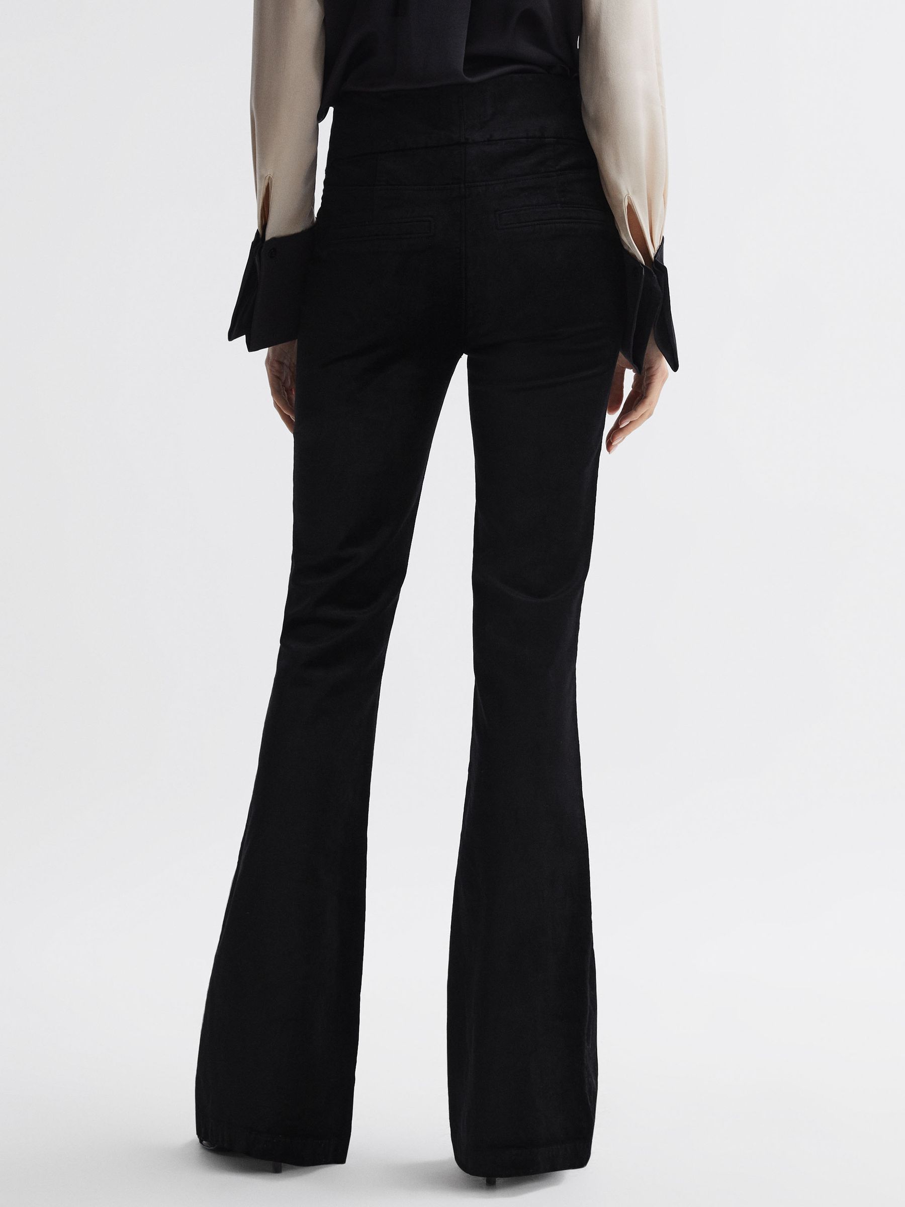 Paige Velvet Flared High Rise Jeans in Black - Image 4 of 5