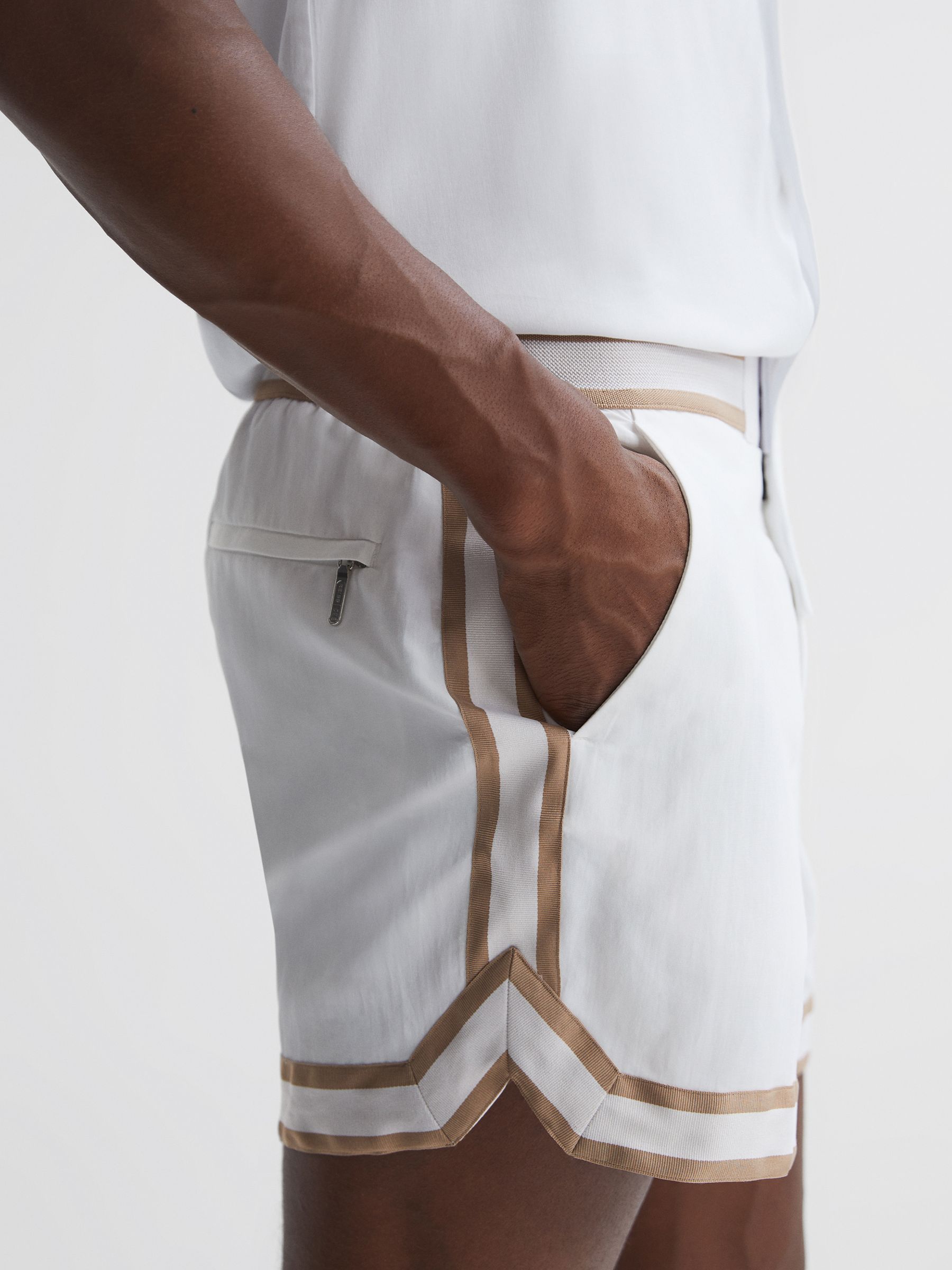 Reiss | Ché Elasticated Waist Contrast Swim Shorts in Neutral/White - Image 1 of 5 Reiss | Ché Elasticated Waist Contrast Swim Shorts in Neutral/White - Image 1 of 5