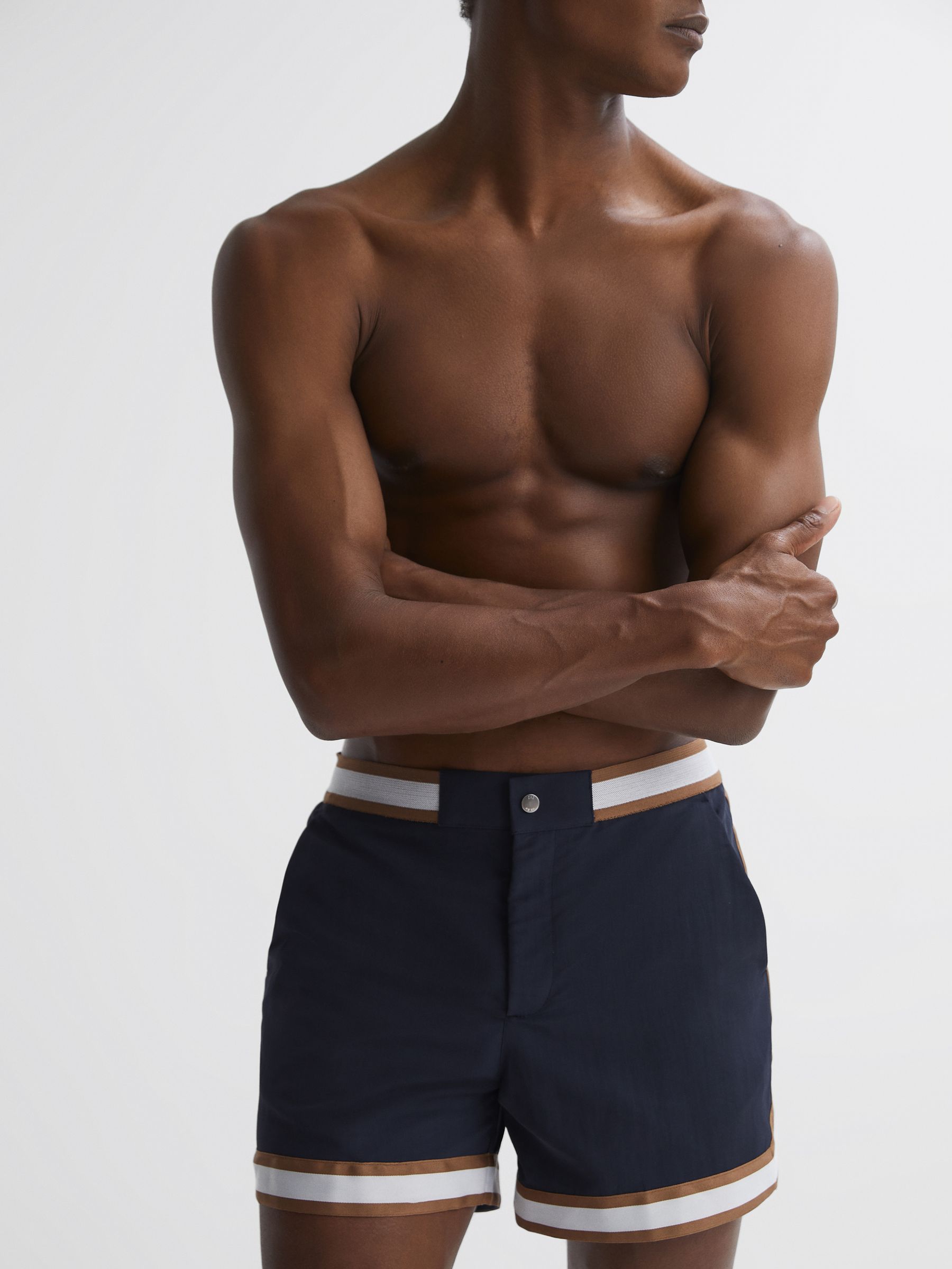 Reiss | Ché Elasticated Waist Contrast Swim Shorts in Navy/Tobacco - Image 4 of 6