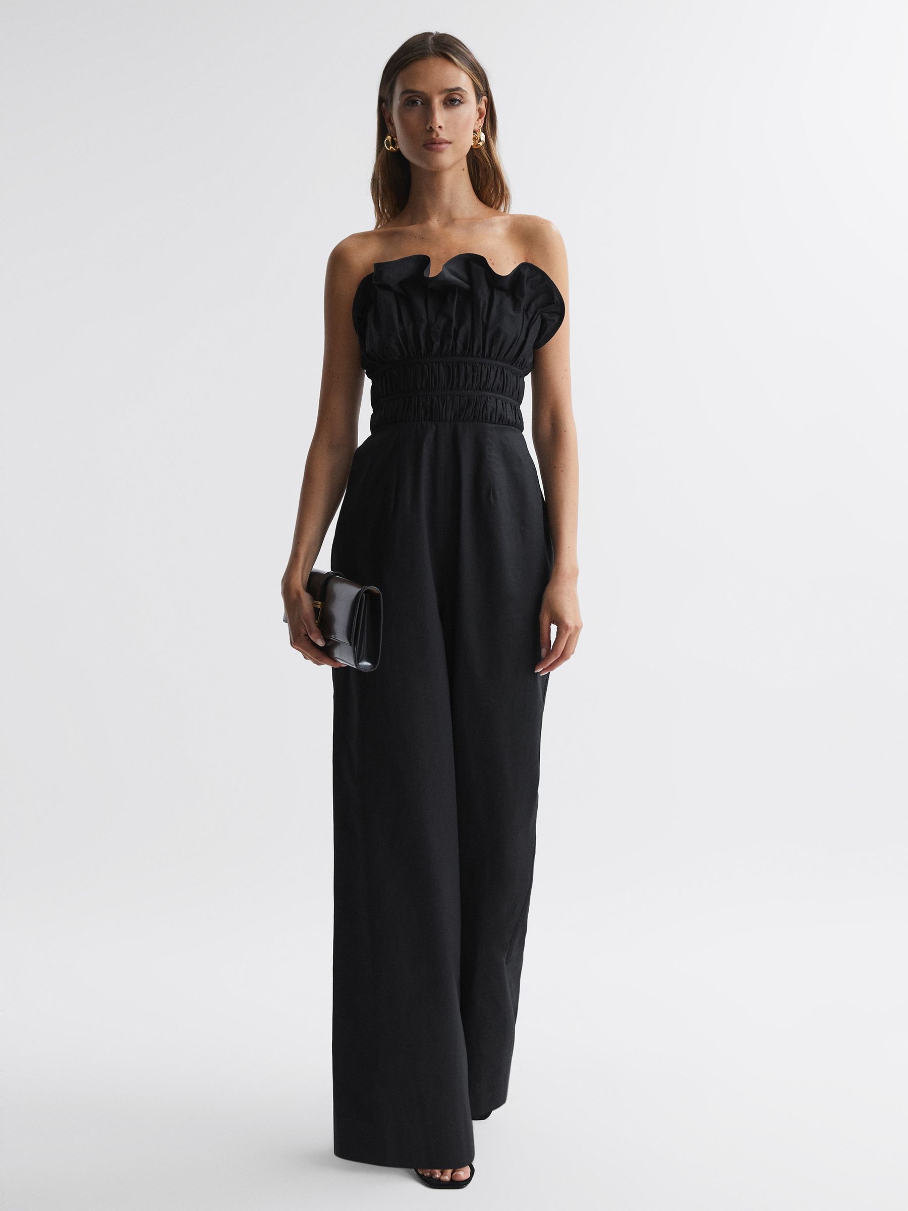 Reiss Amur Wide Leg Strapless Jumpsuit in Black - REISS