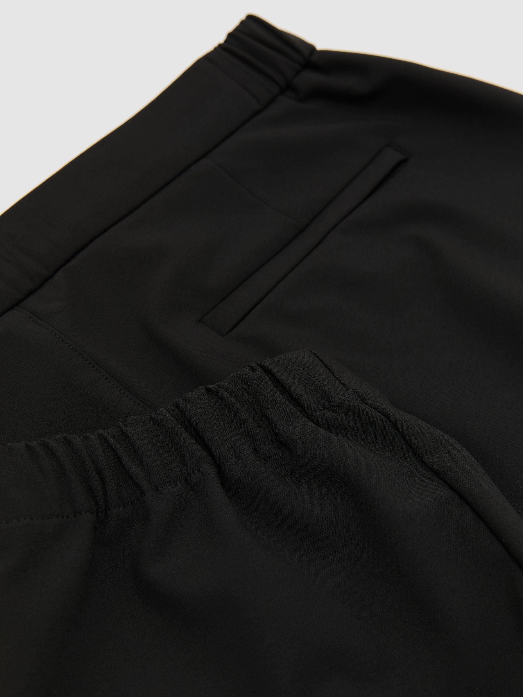 Technical Stretch Tapered Trousers in Black - Image 7 of 7