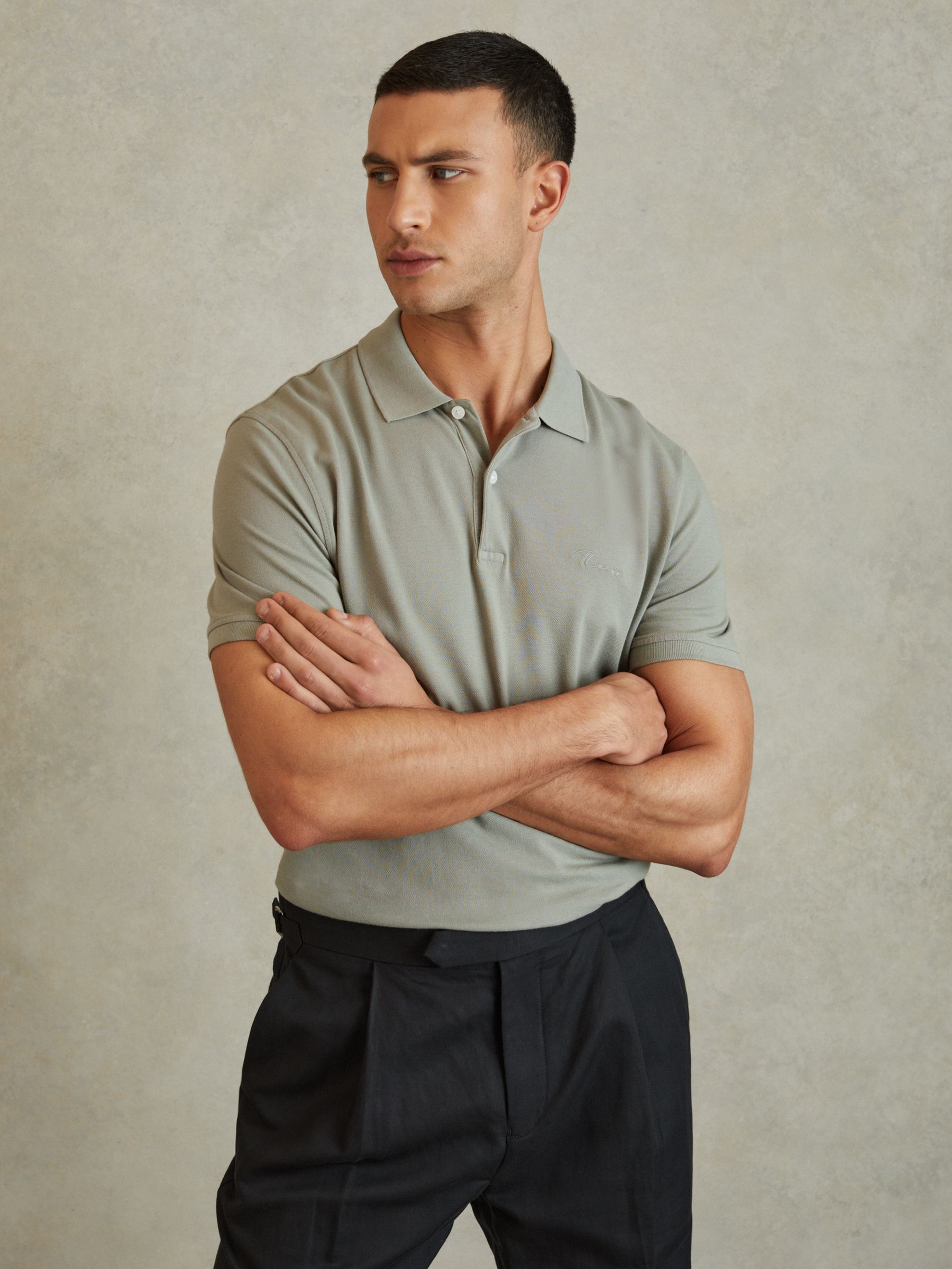 Slim Fit Garment Dyed Embroidered Polo Shirt in Dark Sage - Image 1 of 5