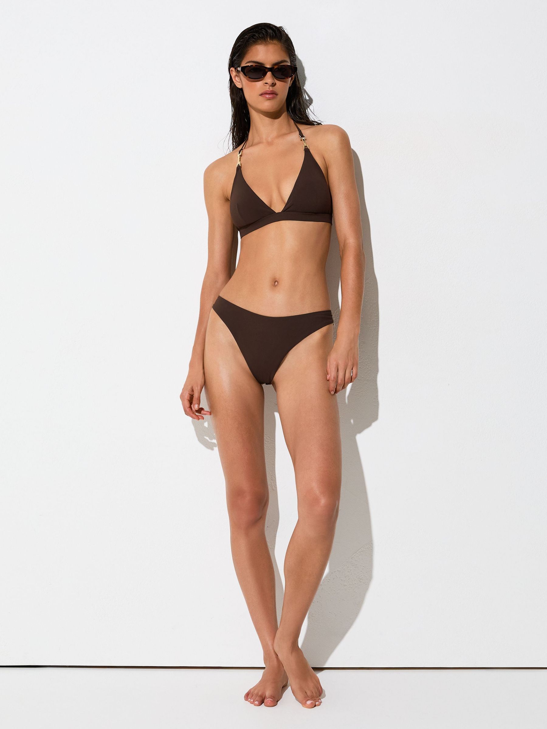Fixed-Side Brazilian Bikini Bottoms in Chocolate Brown - Image 1 of 6 Fixed-Side Brazilian Bikini Bottoms in Chocolate Brown - Image 1 of 6