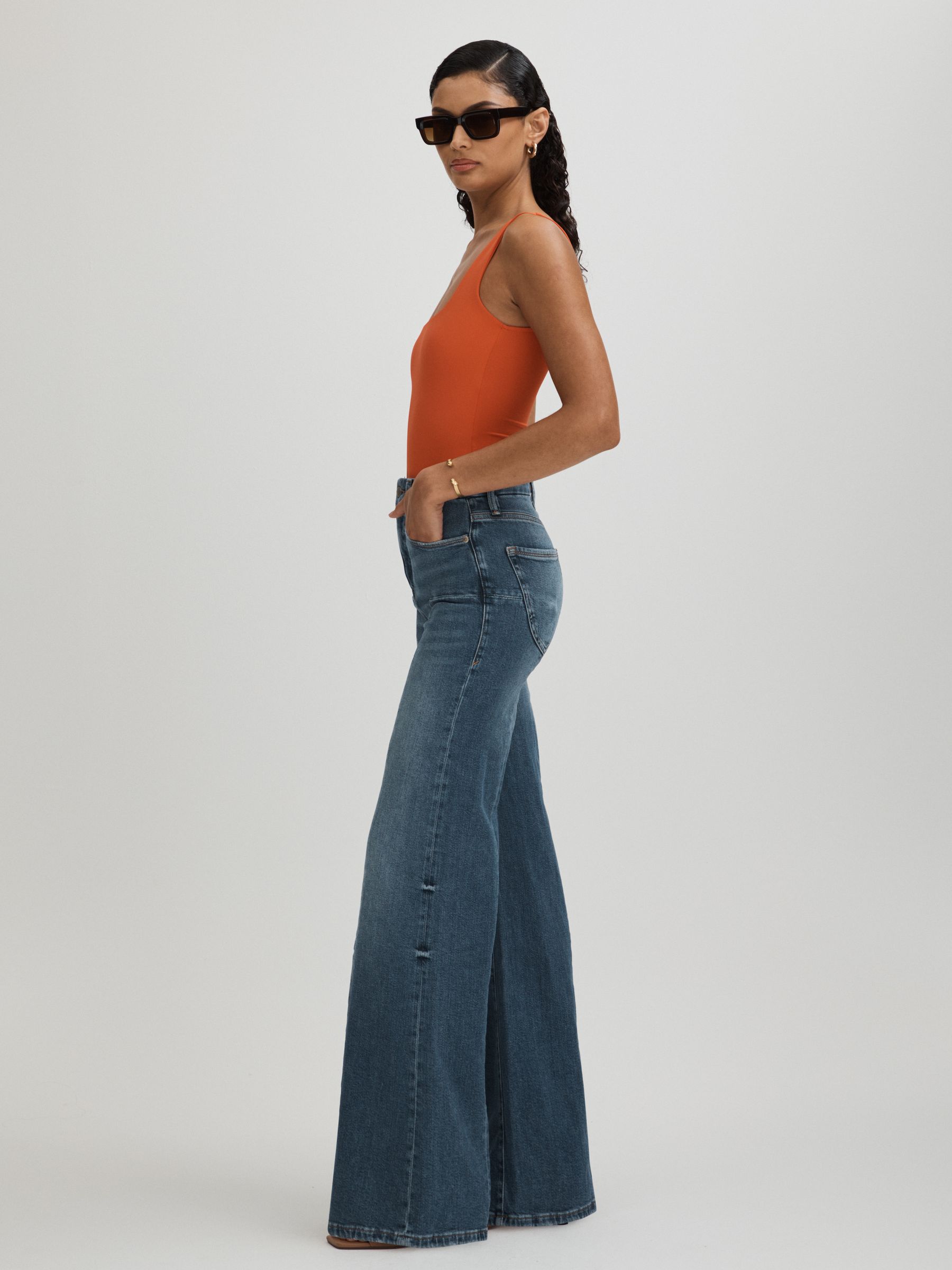 Good American High Rise Distressed Palazzo Jeans in Blue - Image 3 of 6