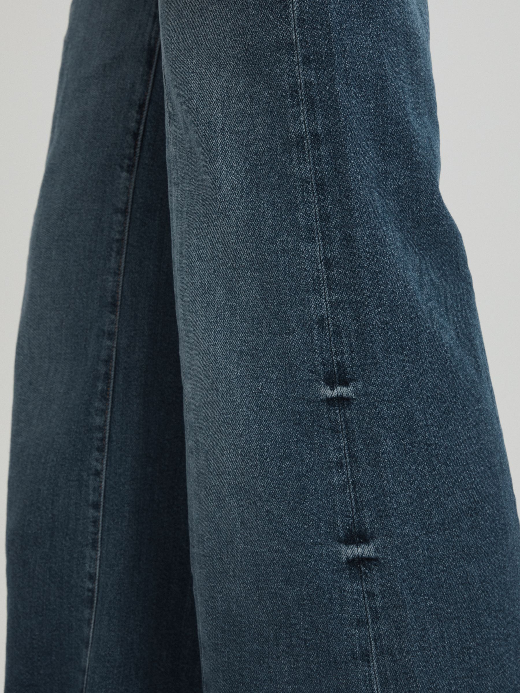 Good American High Rise Distressed Palazzo Jeans in Blue - Image 4 of 6