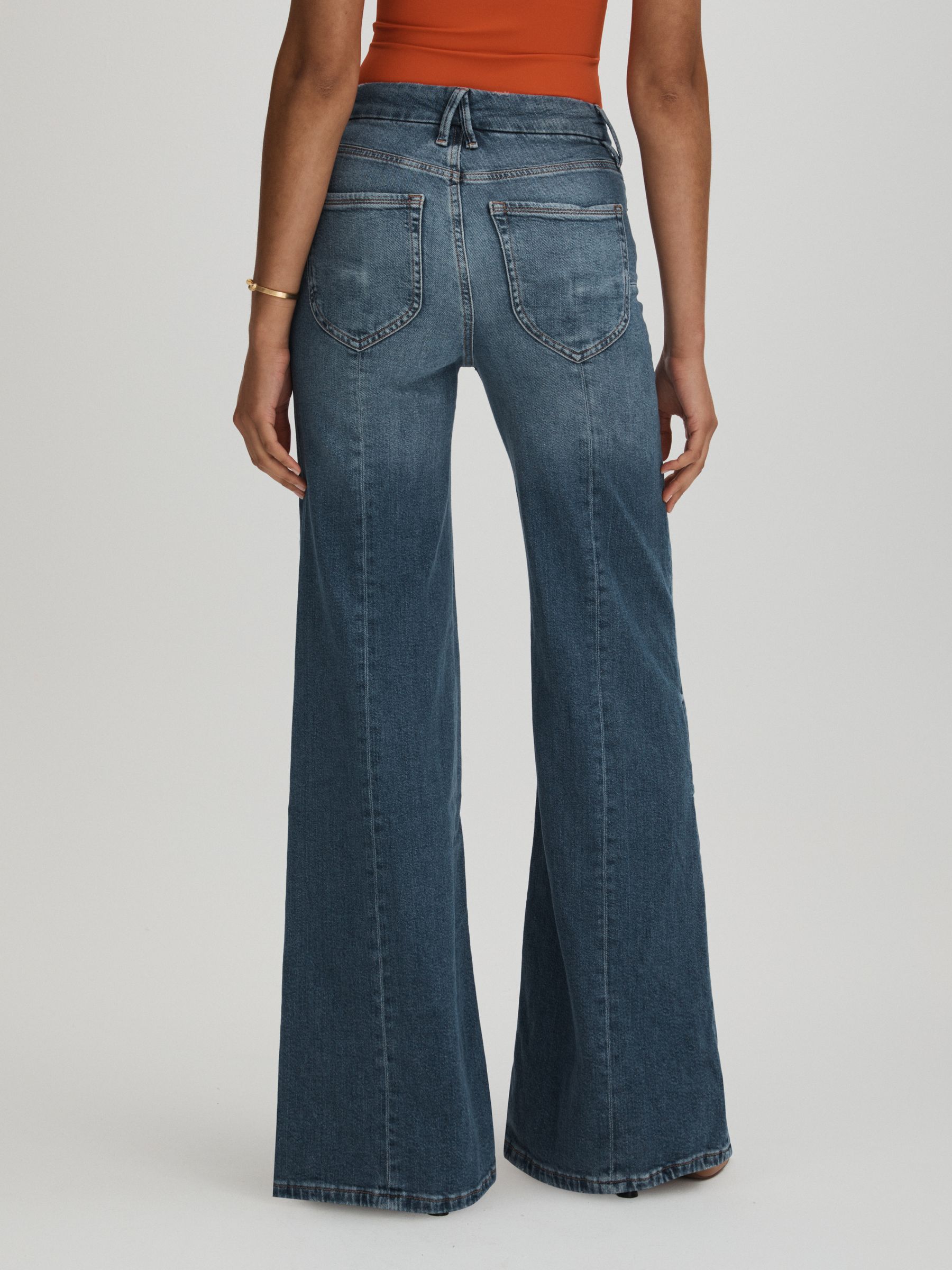 Good American High Rise Distressed Palazzo Jeans in Blue - Image 5 of 6