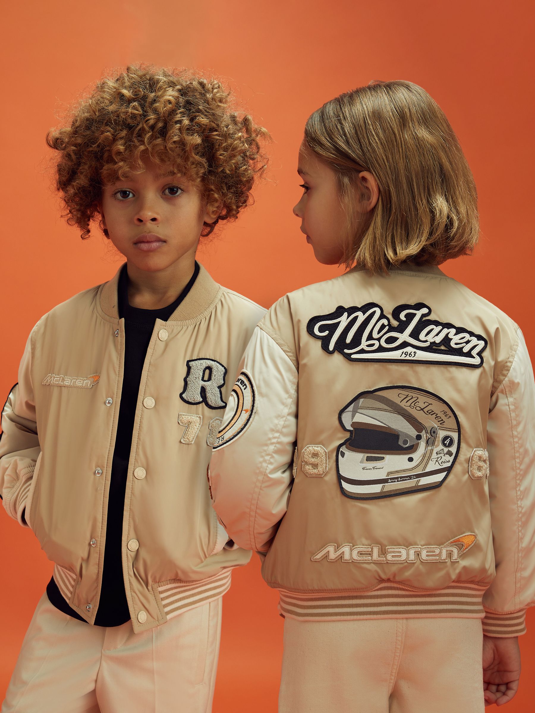 Teen McLaren F1 Patch Varsity Bomber Jacket in Taupe/Ecru - Image 1 of 12 Teen McLaren F1 Patch Varsity Bomber Jacket in Taupe/Ecru - Image 1 of 12