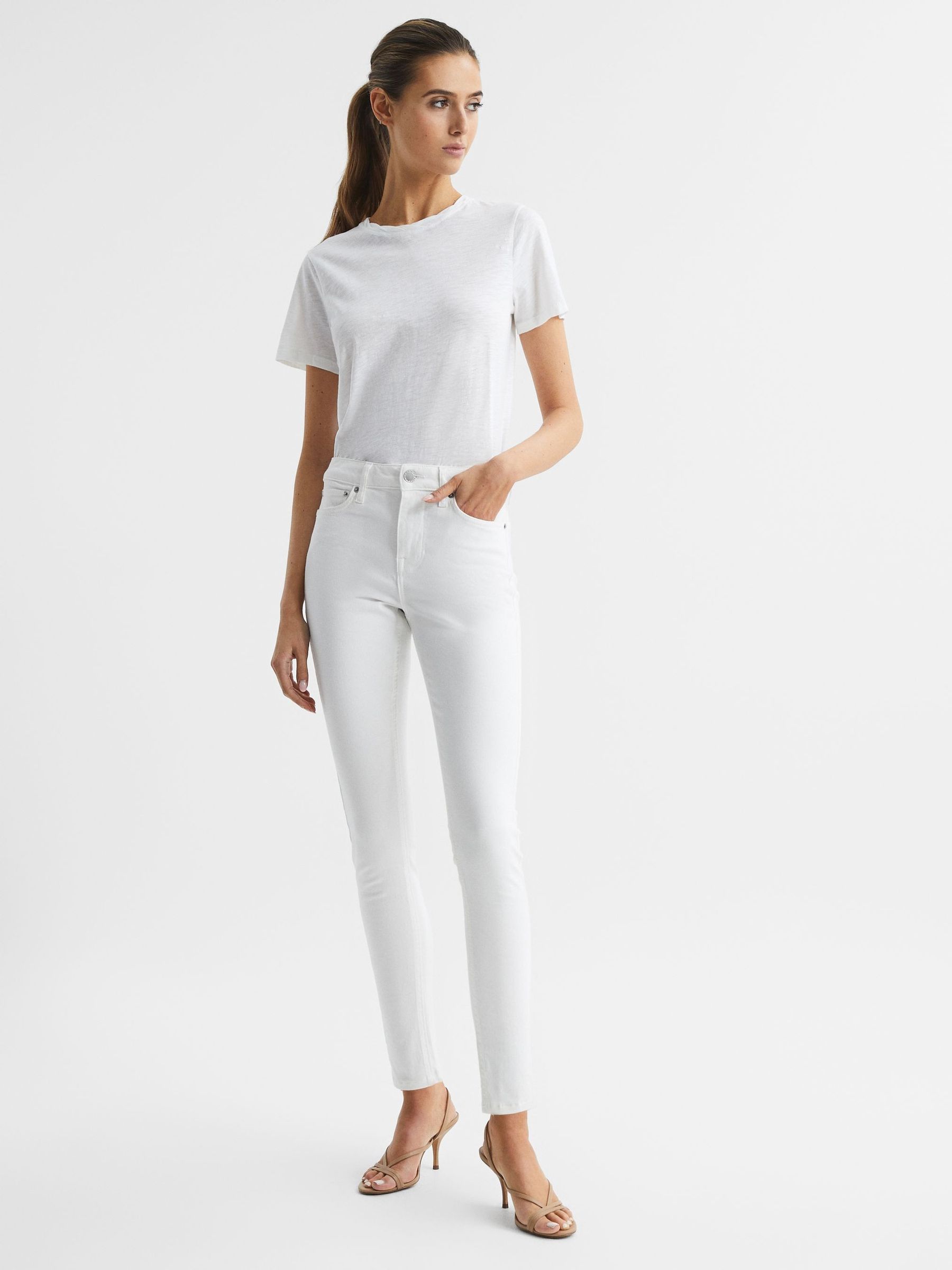 Mid Rise Skinny Jeans in White - Image 16 of 16