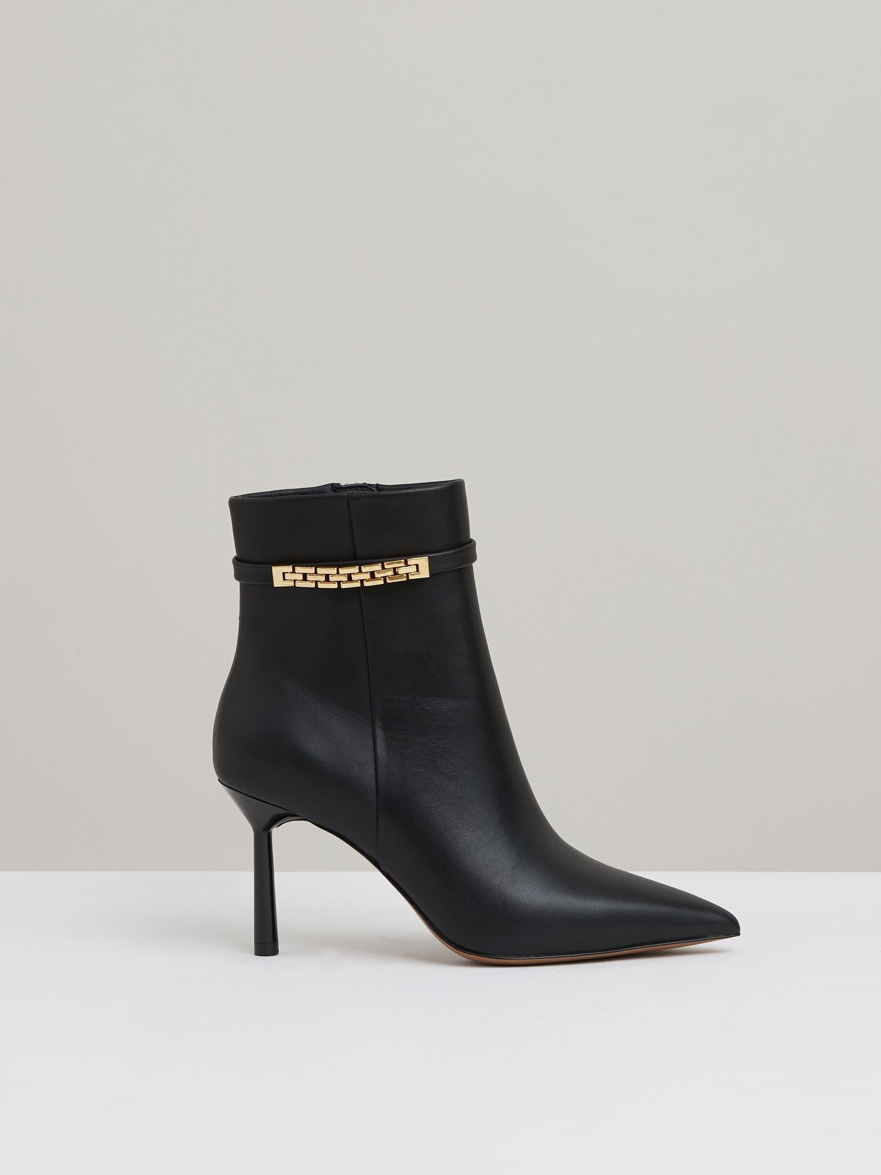 Leather Chain Embellished Ankle Boots in Black - Image 1 of 5