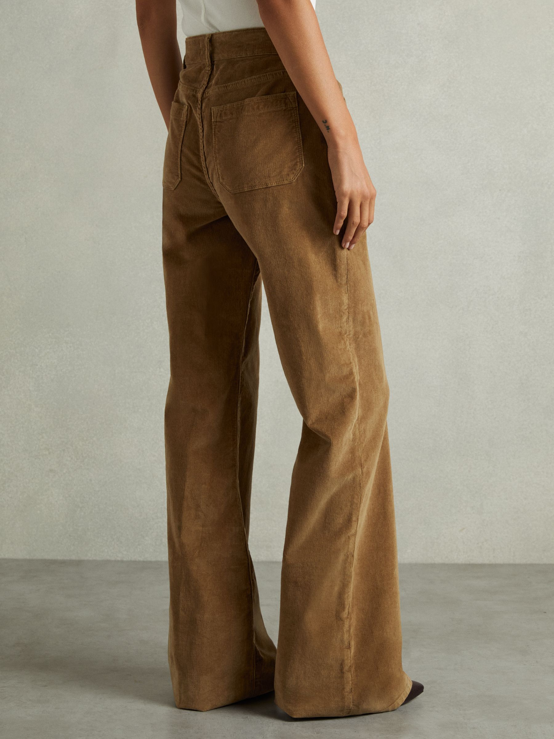 Reiss Petite Cotton-Blend Corduroy Flared Trousers in Brown | REISS