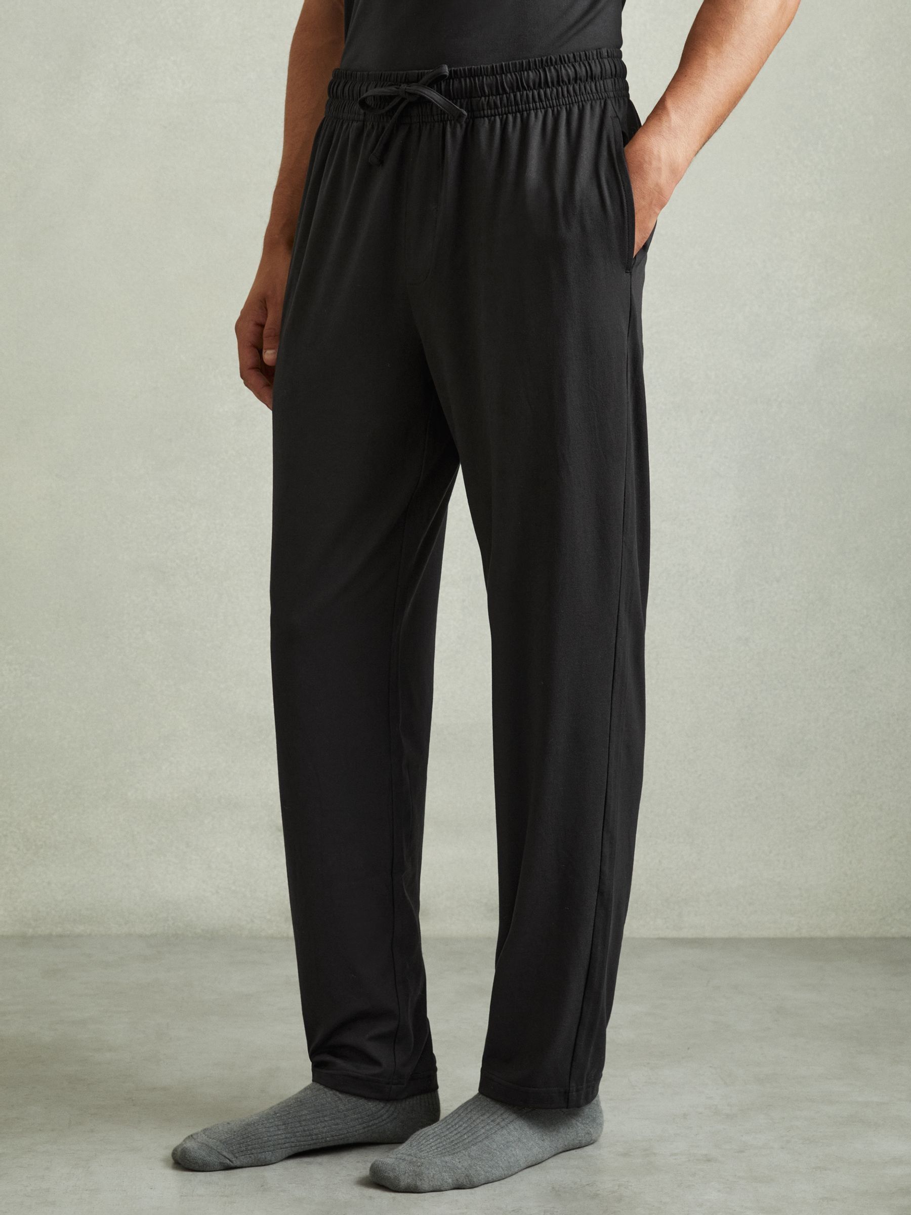 Tapered Stretch-Jersey Joggers in Black - image 3