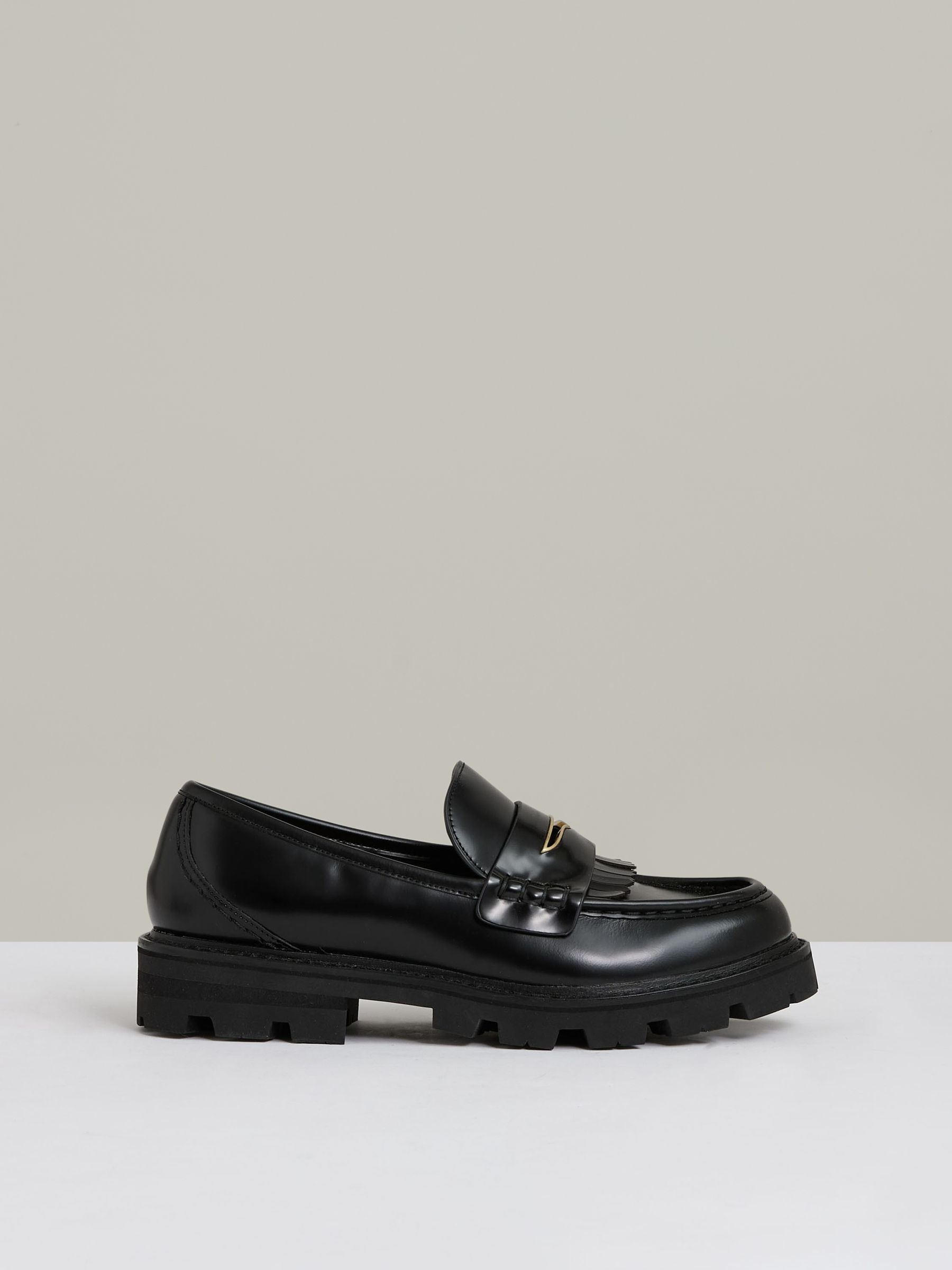 Leather Fringed Chunky Penny Loafers in Black - Image 1 of 6