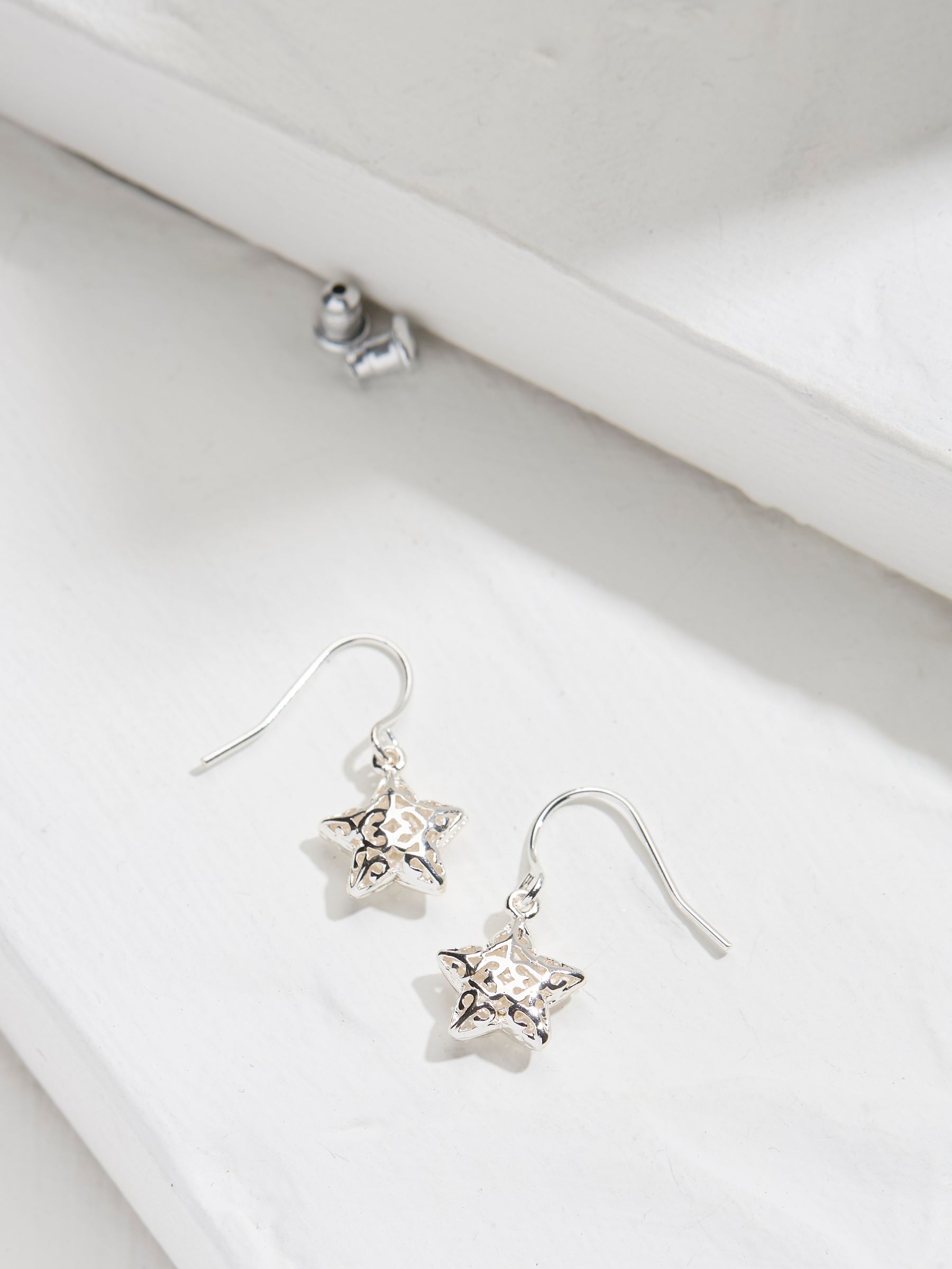Silver Tone Filagree Star Drop Earrings - Image 1 of 2