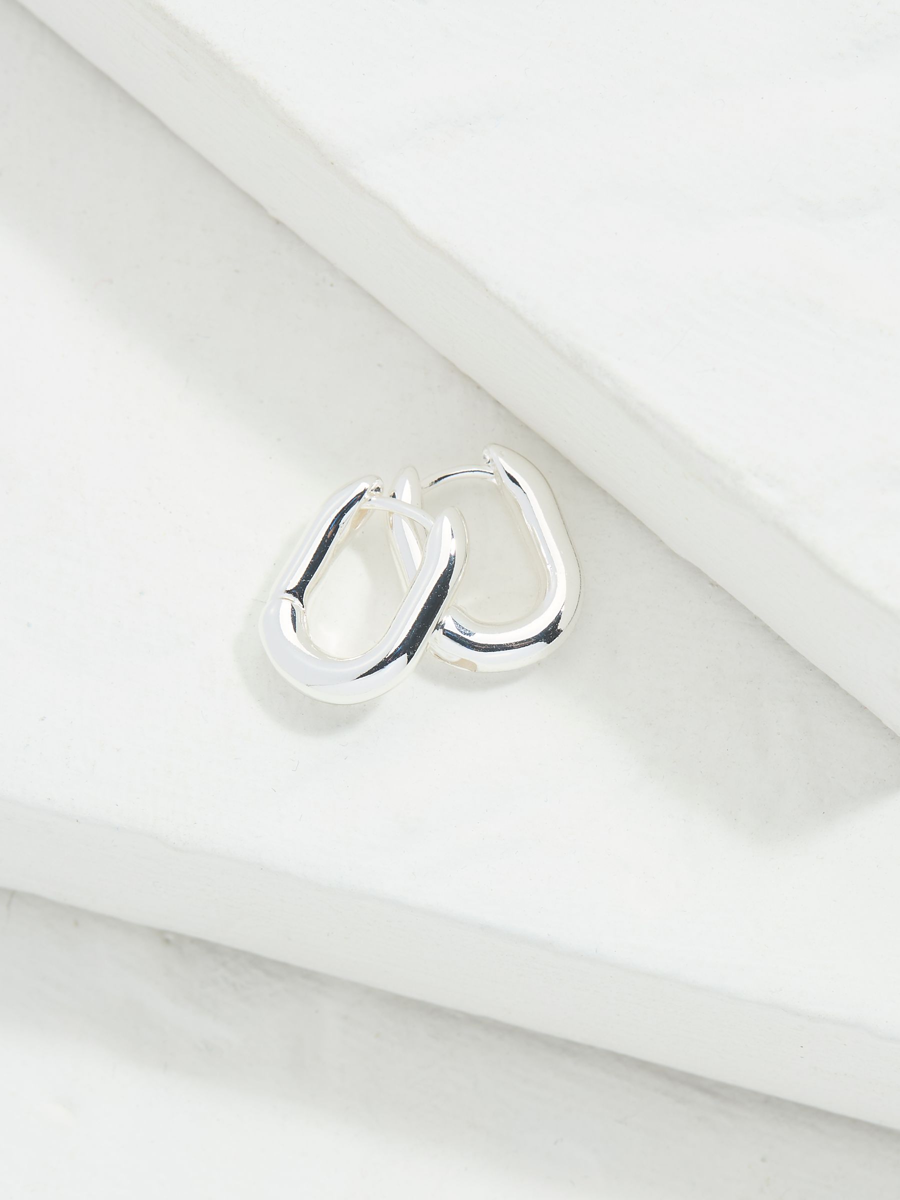 Silver Tone Oval Huggie Hoop Earrings - Image 2 of 3