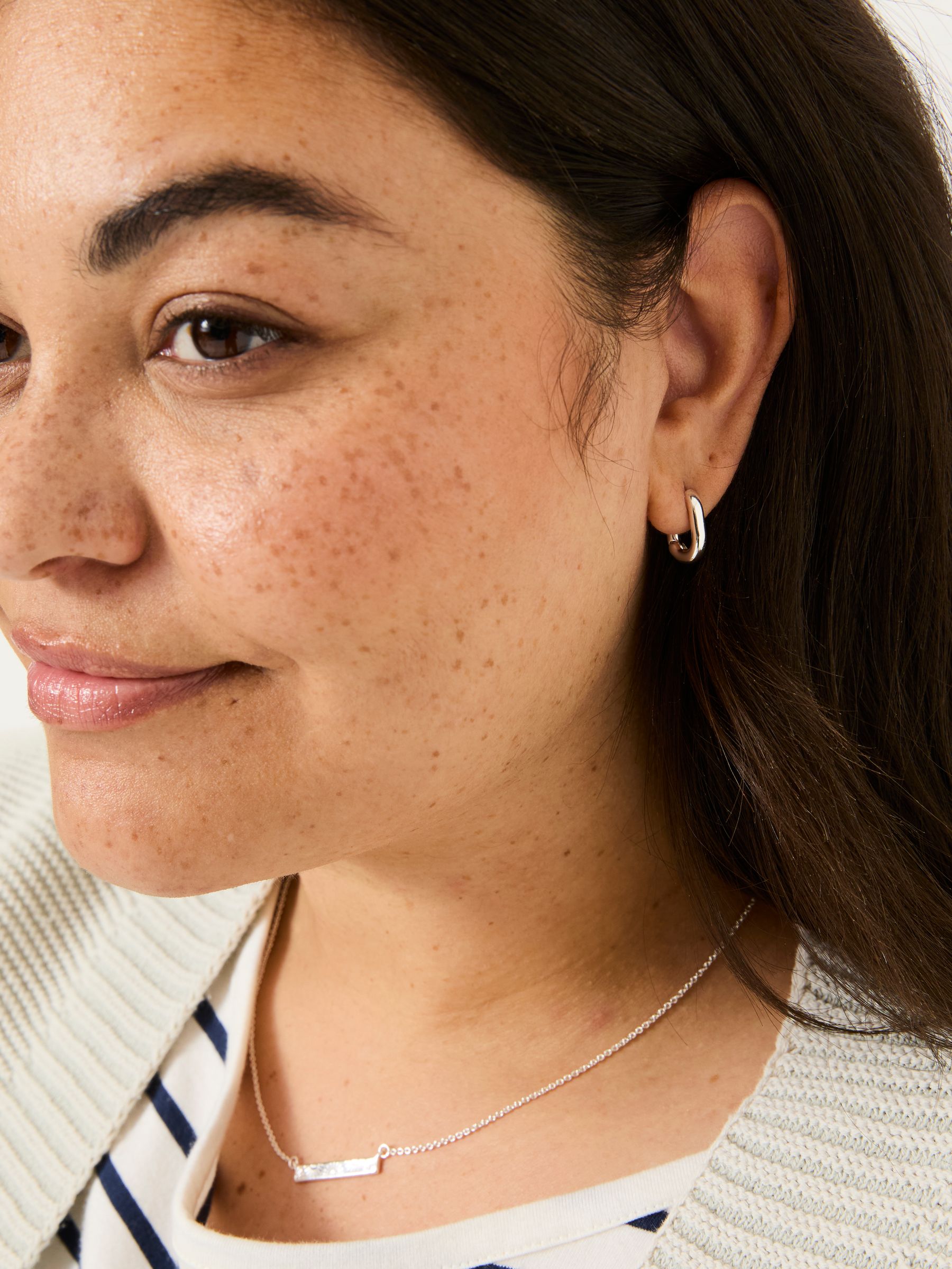 Silver Tone Oval Huggie Hoop Earrings - Image 3 of 3