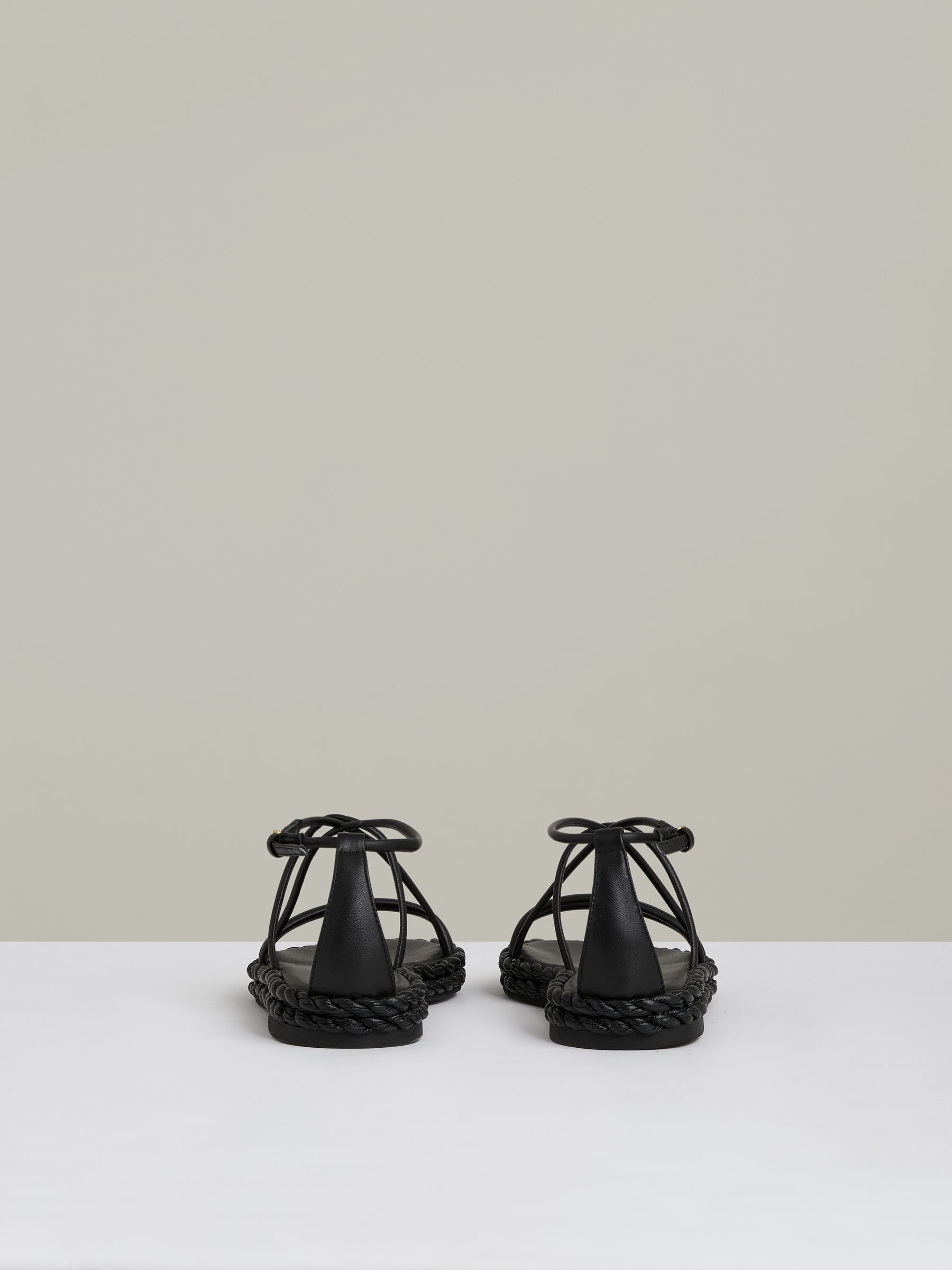 Leather Braided Flat Sandals in Black - image 4