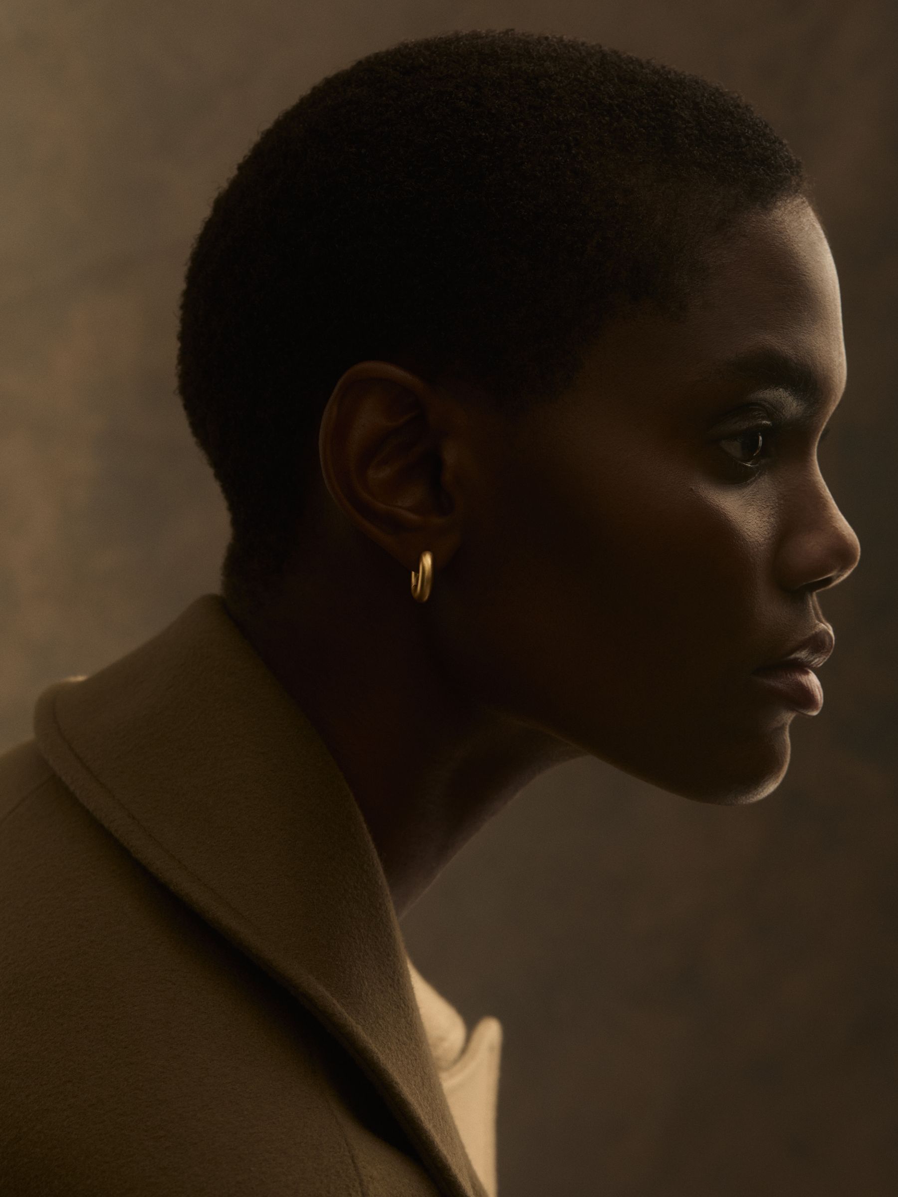 Huggie Earrings in Gold - Image 1 of 5