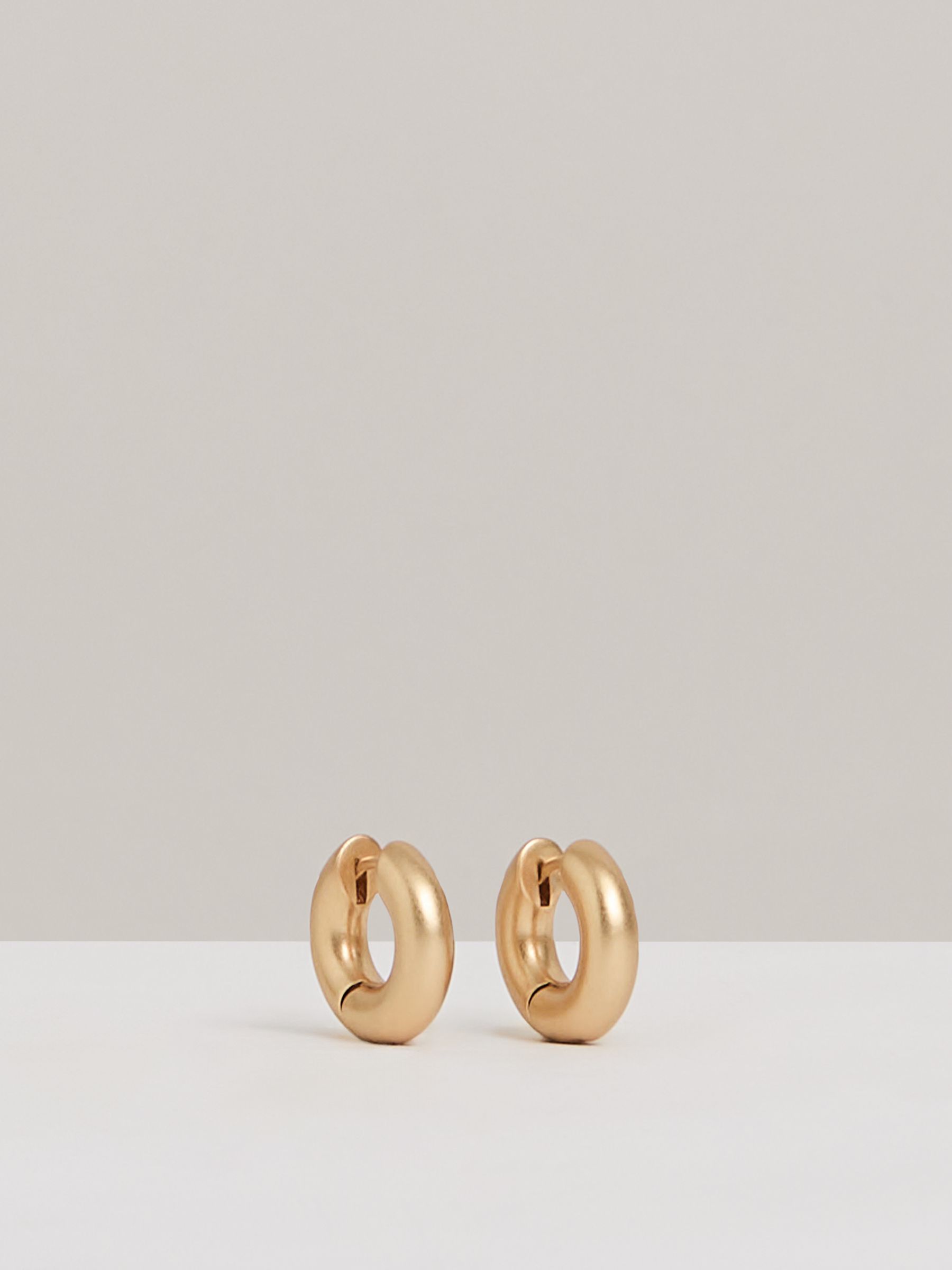 Huggie Earrings in Gold - Image 2 of 5