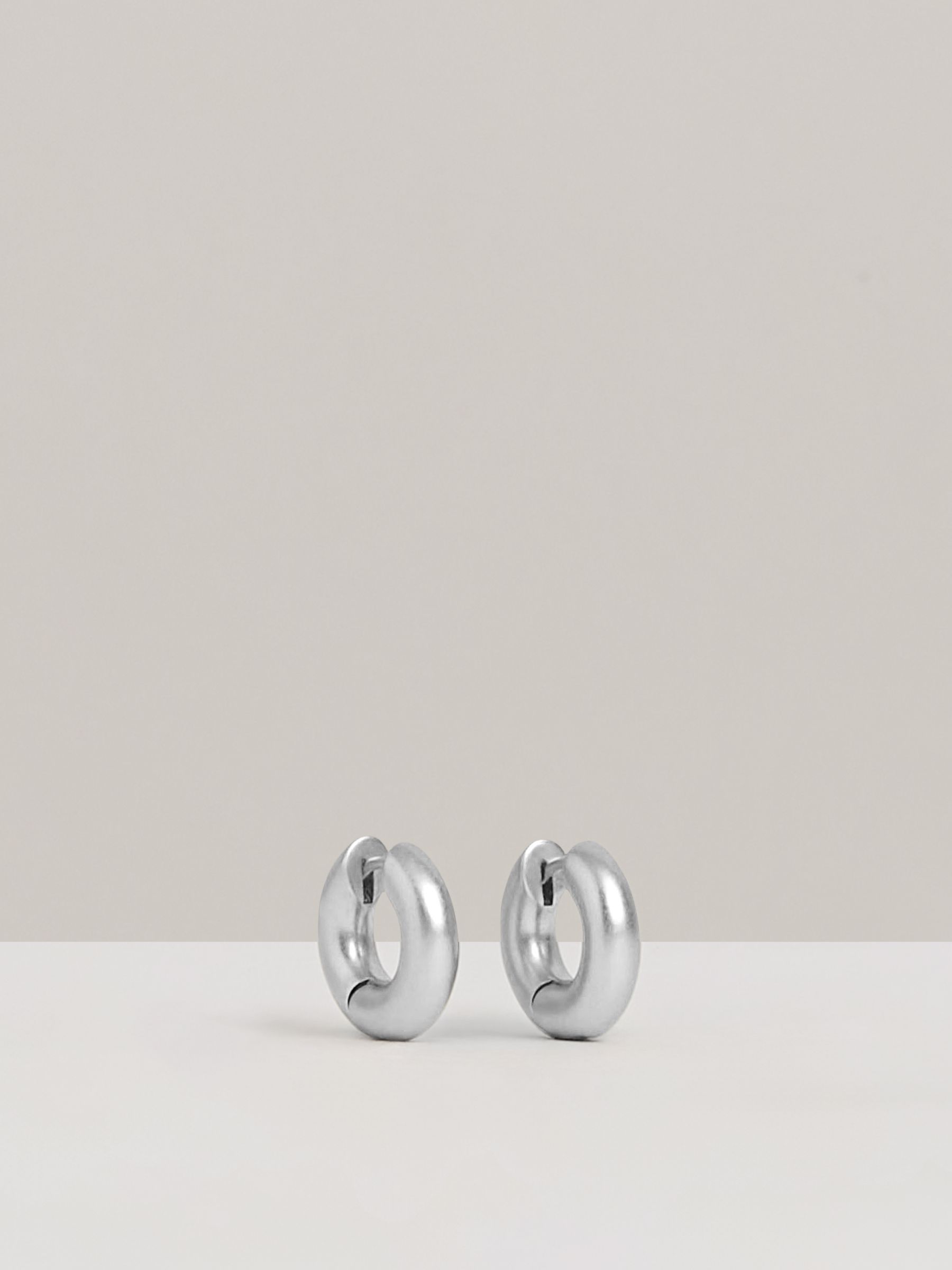 Huggie Earrings in Silver - Image 1 of 5
