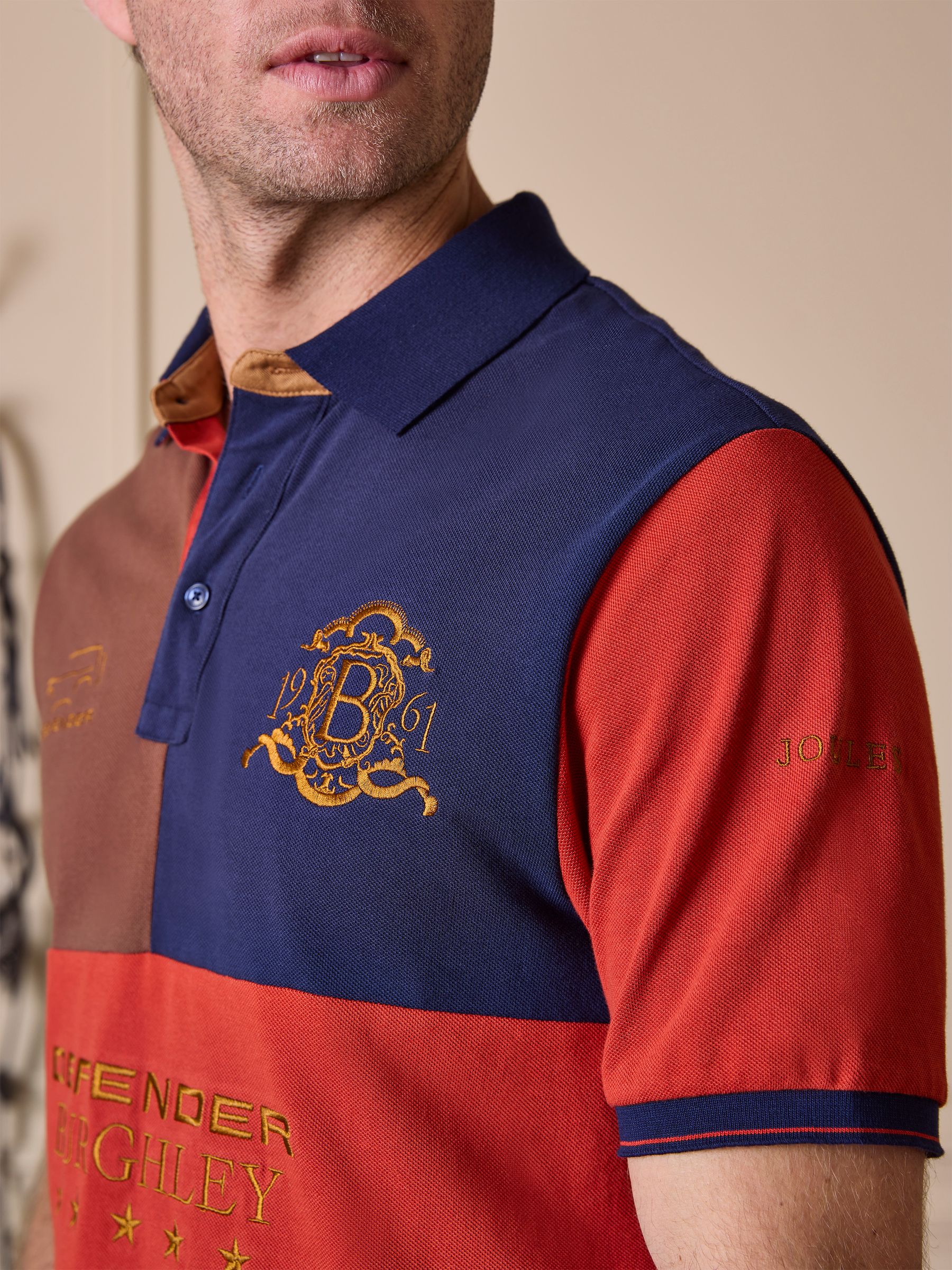 Official Burghley Orange/Navy Polo Shirt - Image 4 of 5