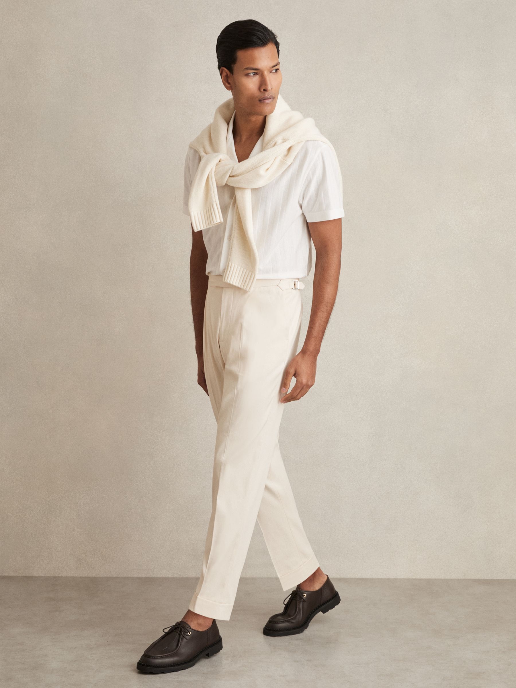 Cotton-Blend Tapered Trousers in Stone - Image 1 of 6