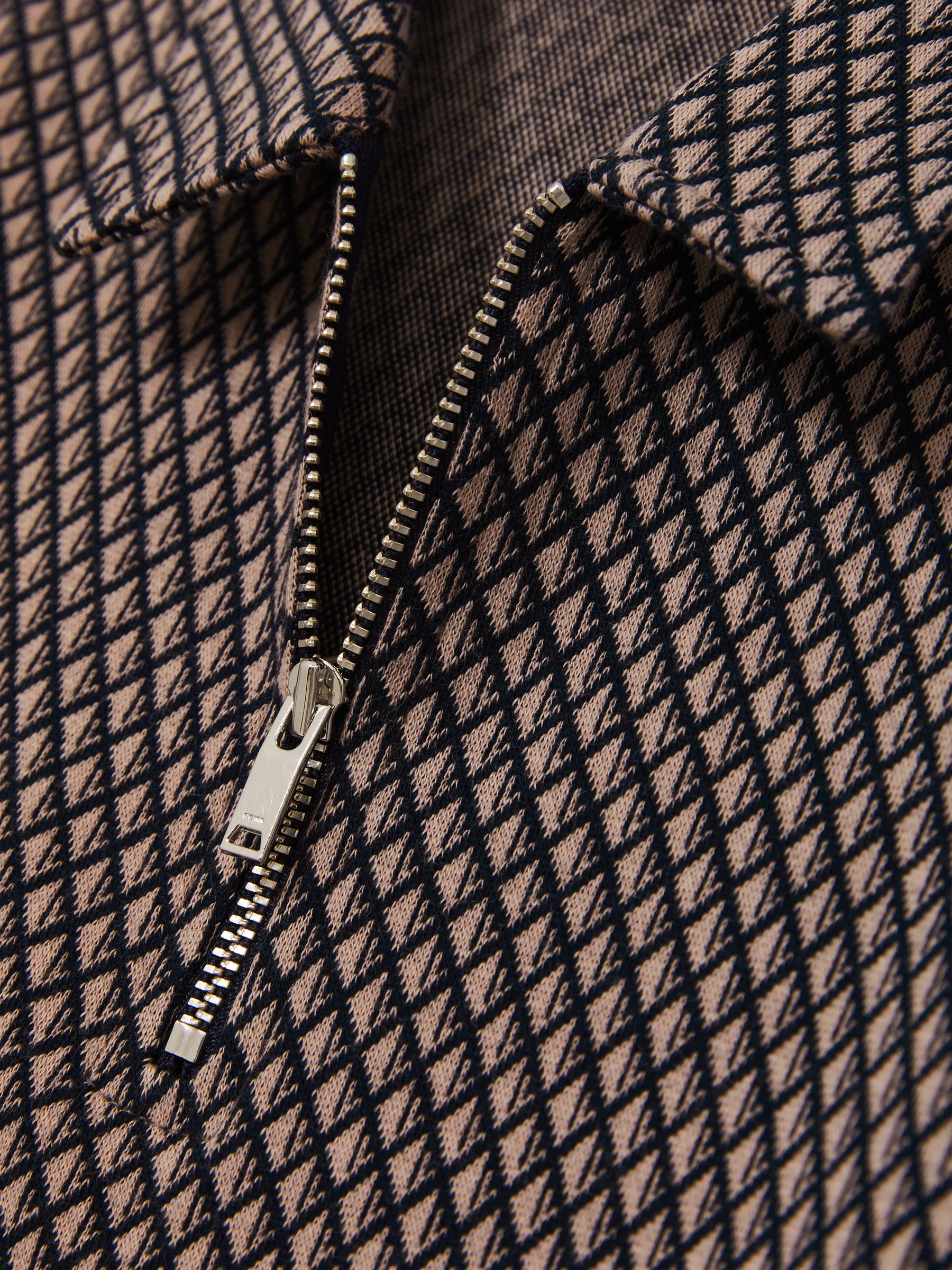 3-9 yrs Geometric Jacquard Polo Shirt in Tobacco Brown/Navy - Image 4 of 4