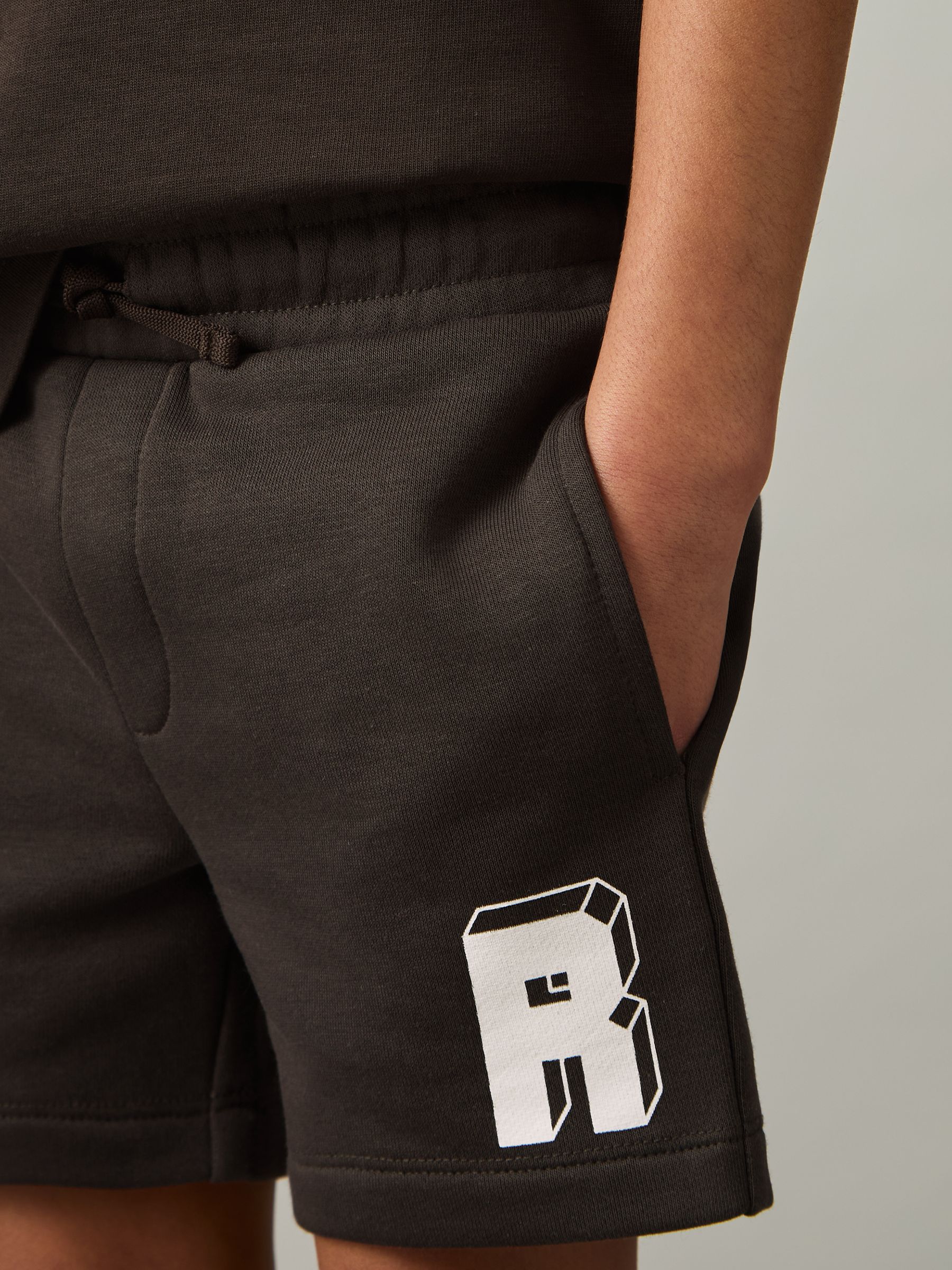 9-13 yrs Jersey Drawstring R Print Shorts in Chocolate Brown / Off White - Image 1 of 4