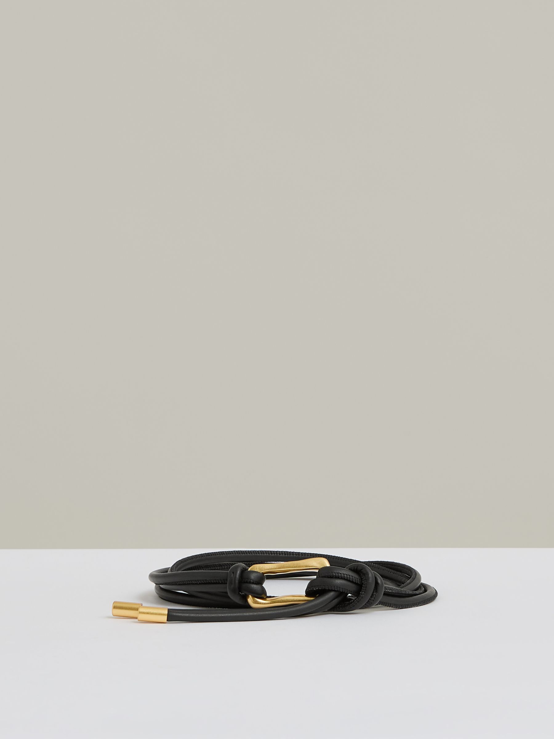 Sculpted Buckle Tubular Tie Belt in Black - Image 1 of 4