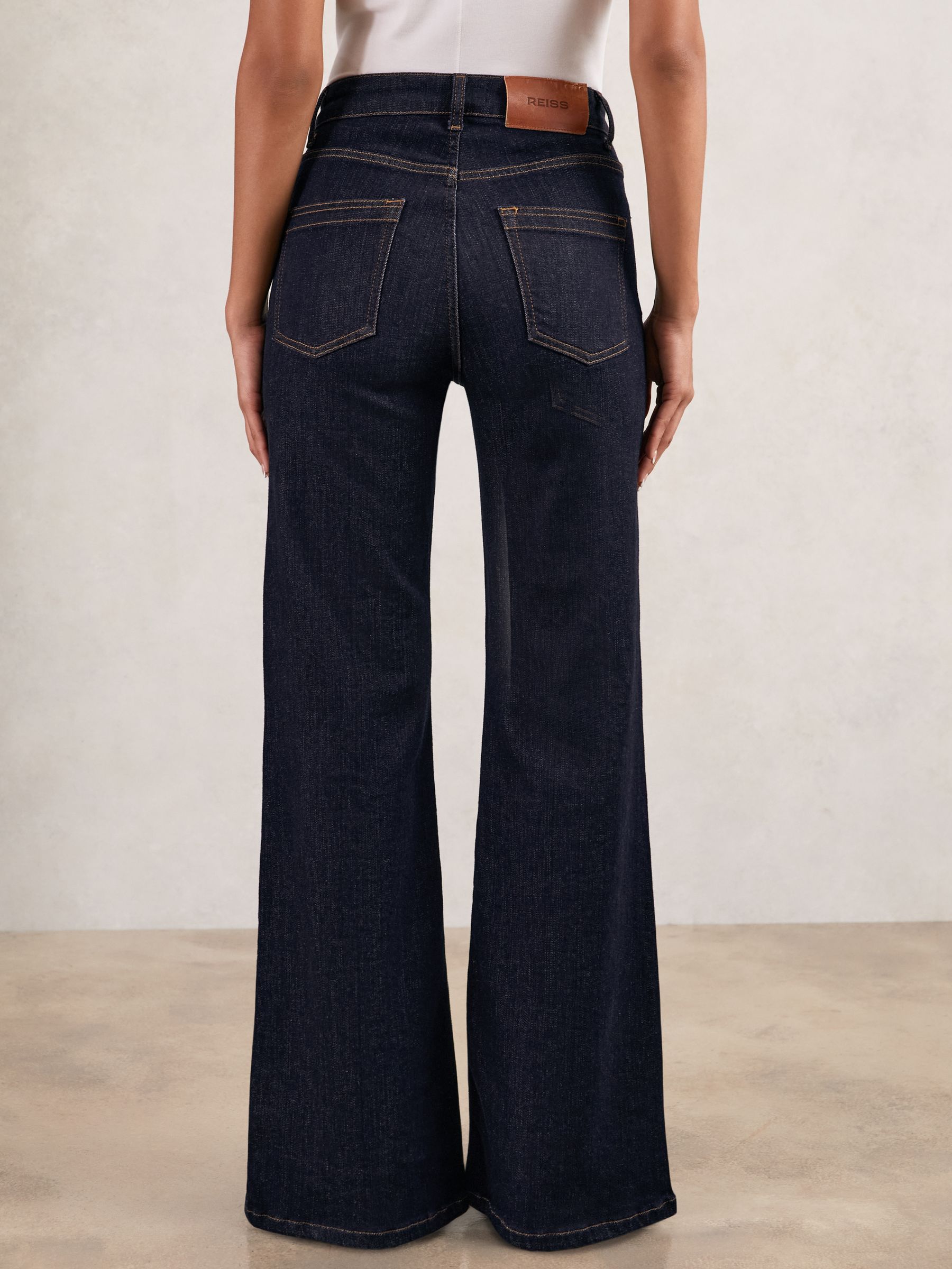 Petite Mid-Rise Flared Jeans in Dark Blue - image 5