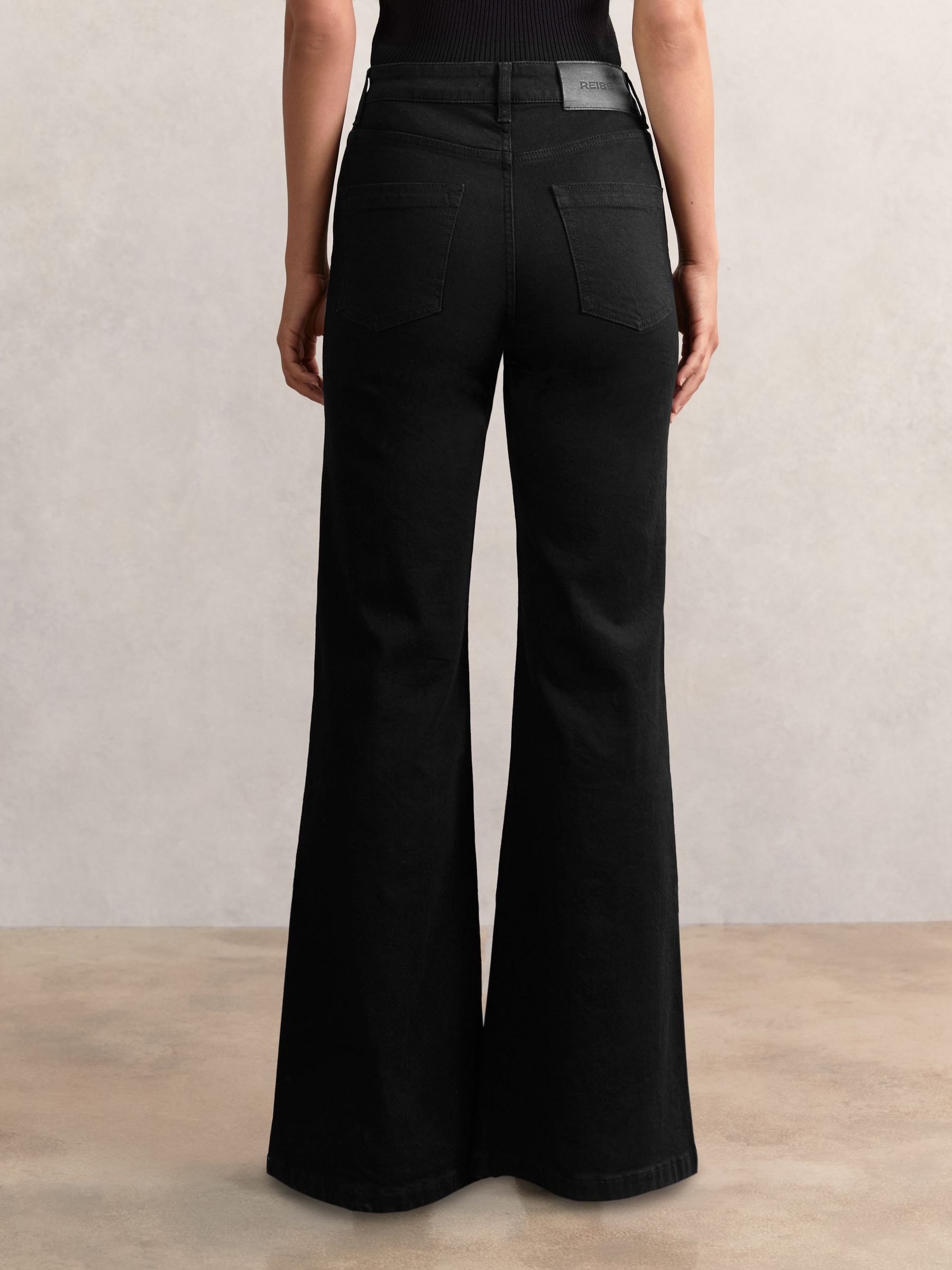 Mid-Rise Flared Jeans in Black - image 3